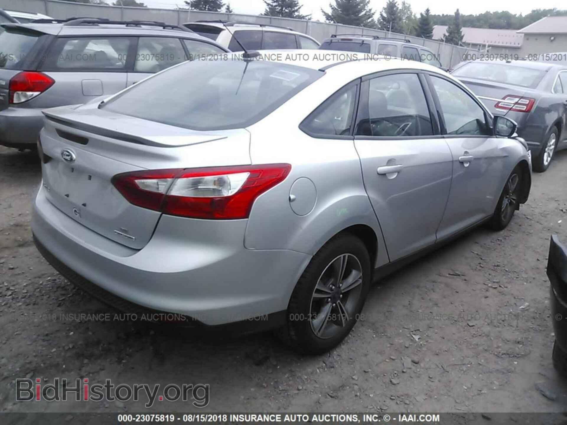 2014 Ford Focus - VIN: 1FADP3F20EL388348 - Photo 4
