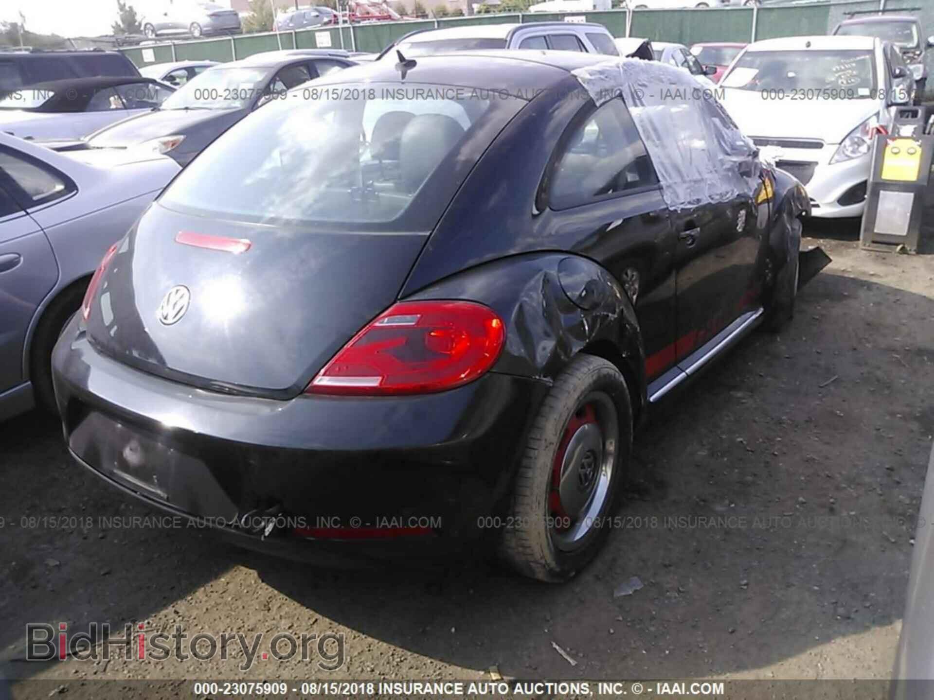2012 Volkswagen Beetle - VIN: 3VWJP7AT2CM661609 - Фото 4