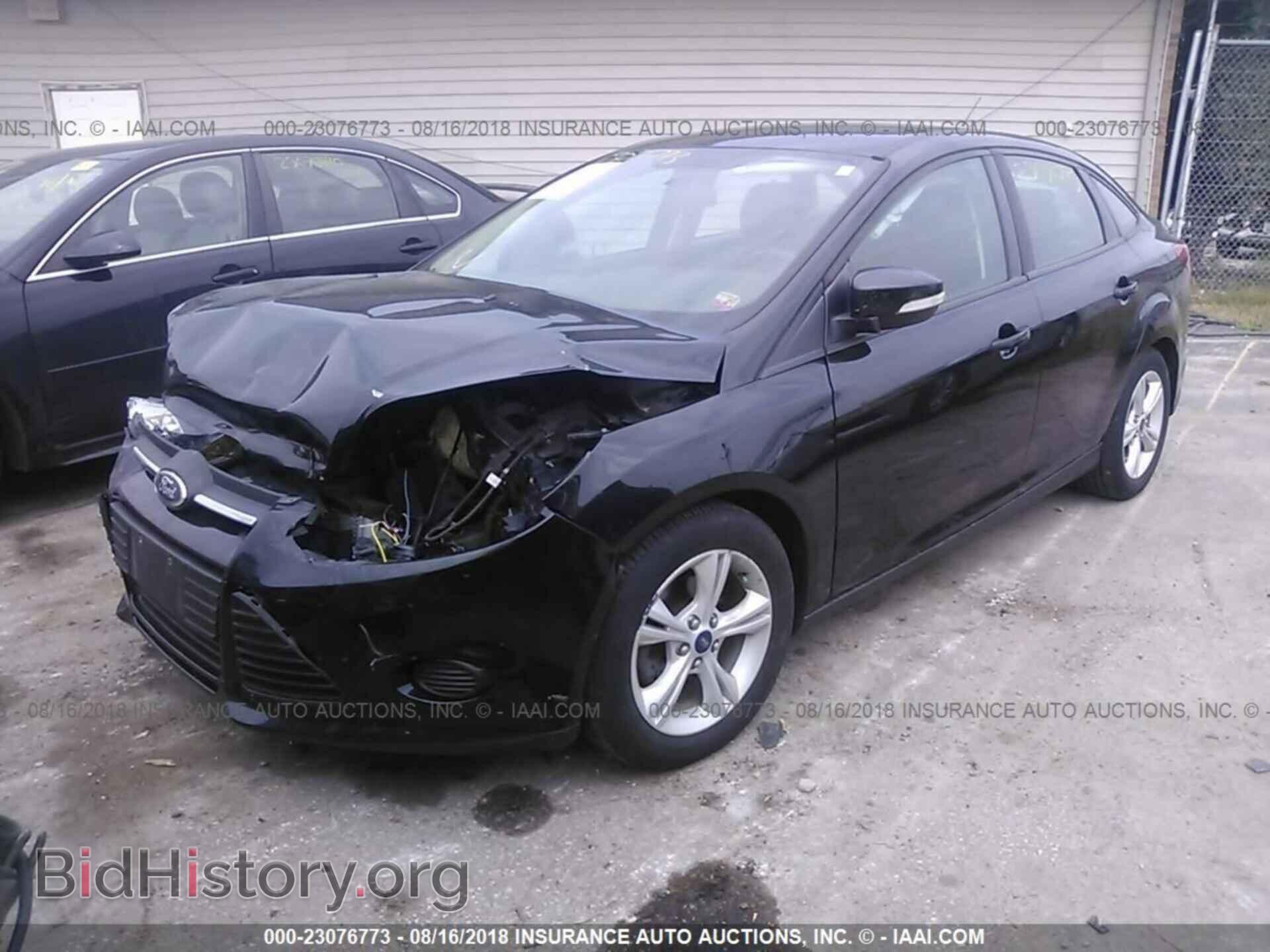 2014 Ford Focus - VIN: 1FADP3F28EL427784 - Фото 2