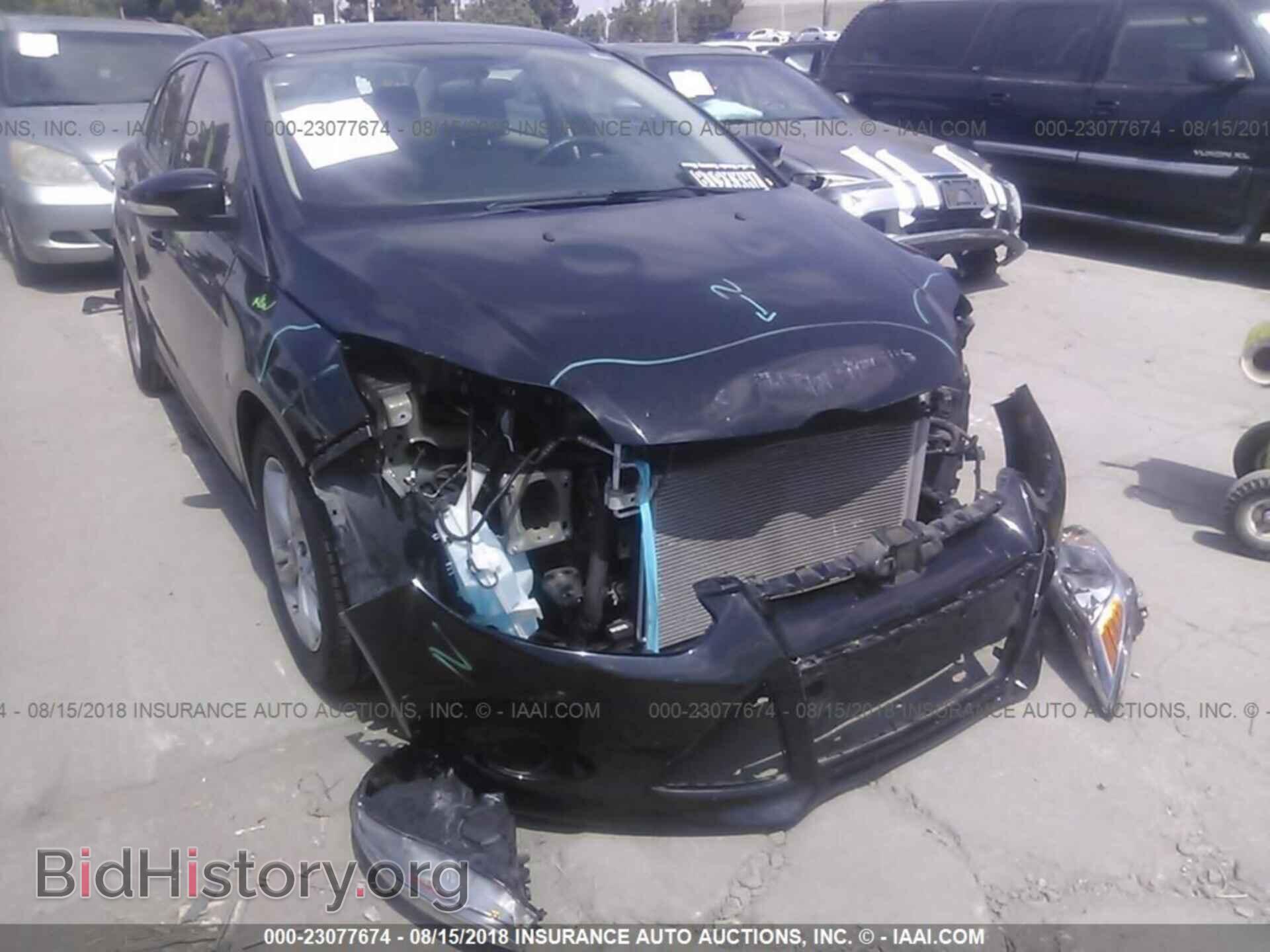 Photo 1FADP3F2XEL453402 - Ford Focus 2014
