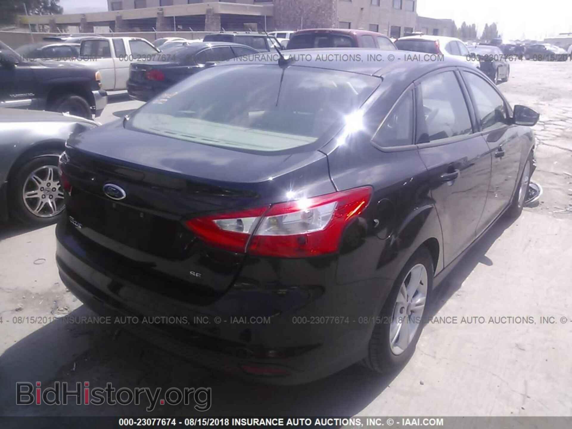 2014 Ford Focus - VIN: 1FADP3F2XEL453402 - Фото 4