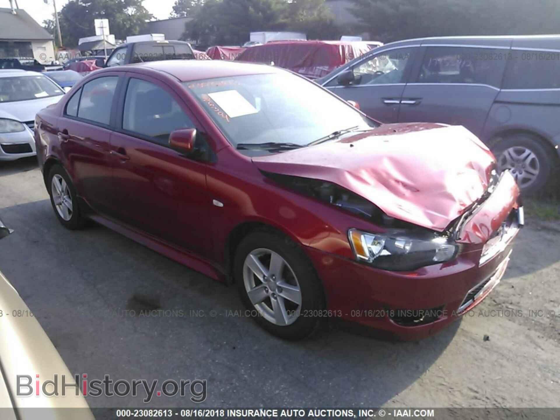 Фотография JA32V2FW5EU013438 - Mitsubishi Lancer 2014