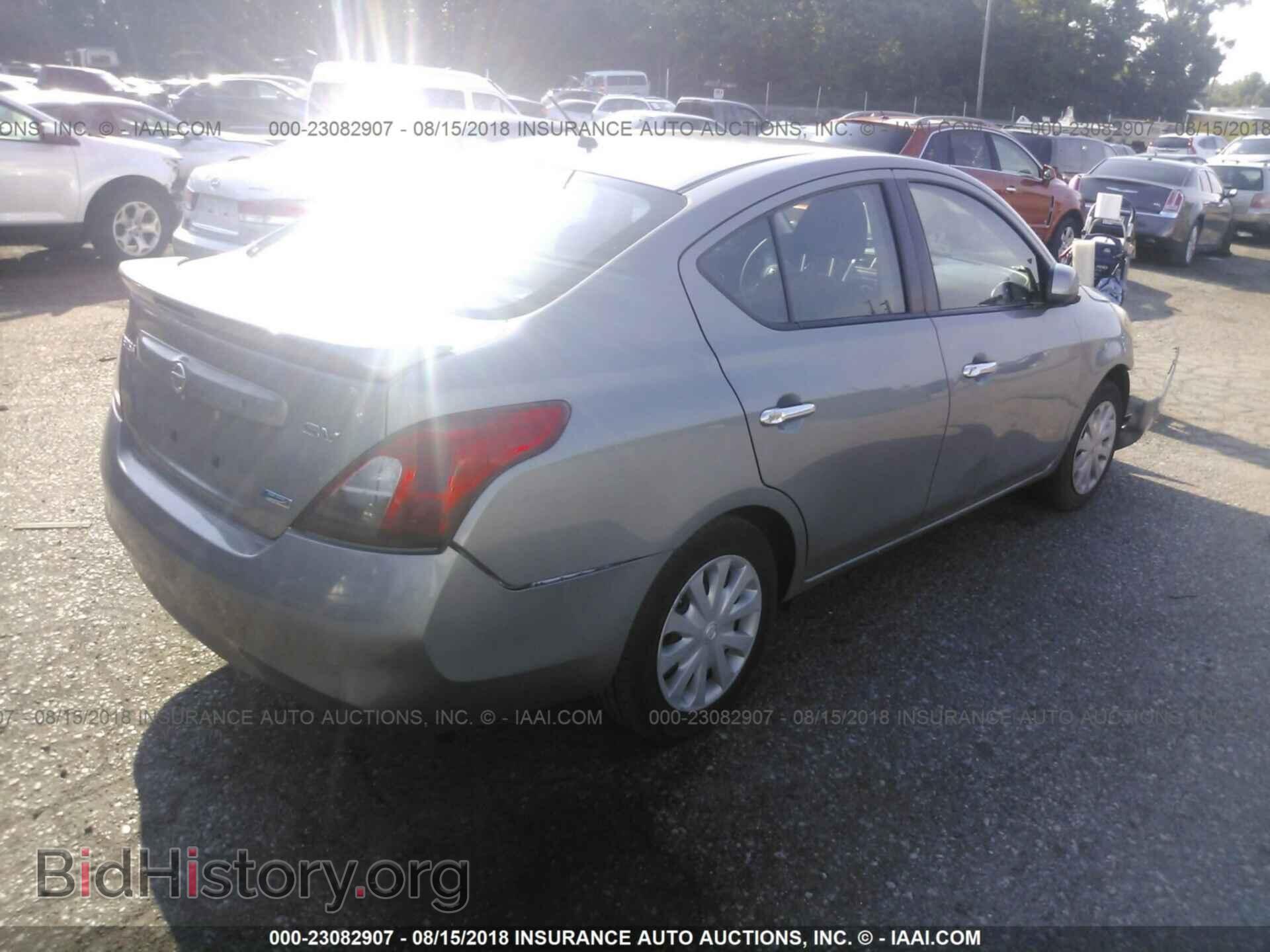 2014 Nissan Versa - VIN: 3N1CN7AP4EK449638 - Фото 4