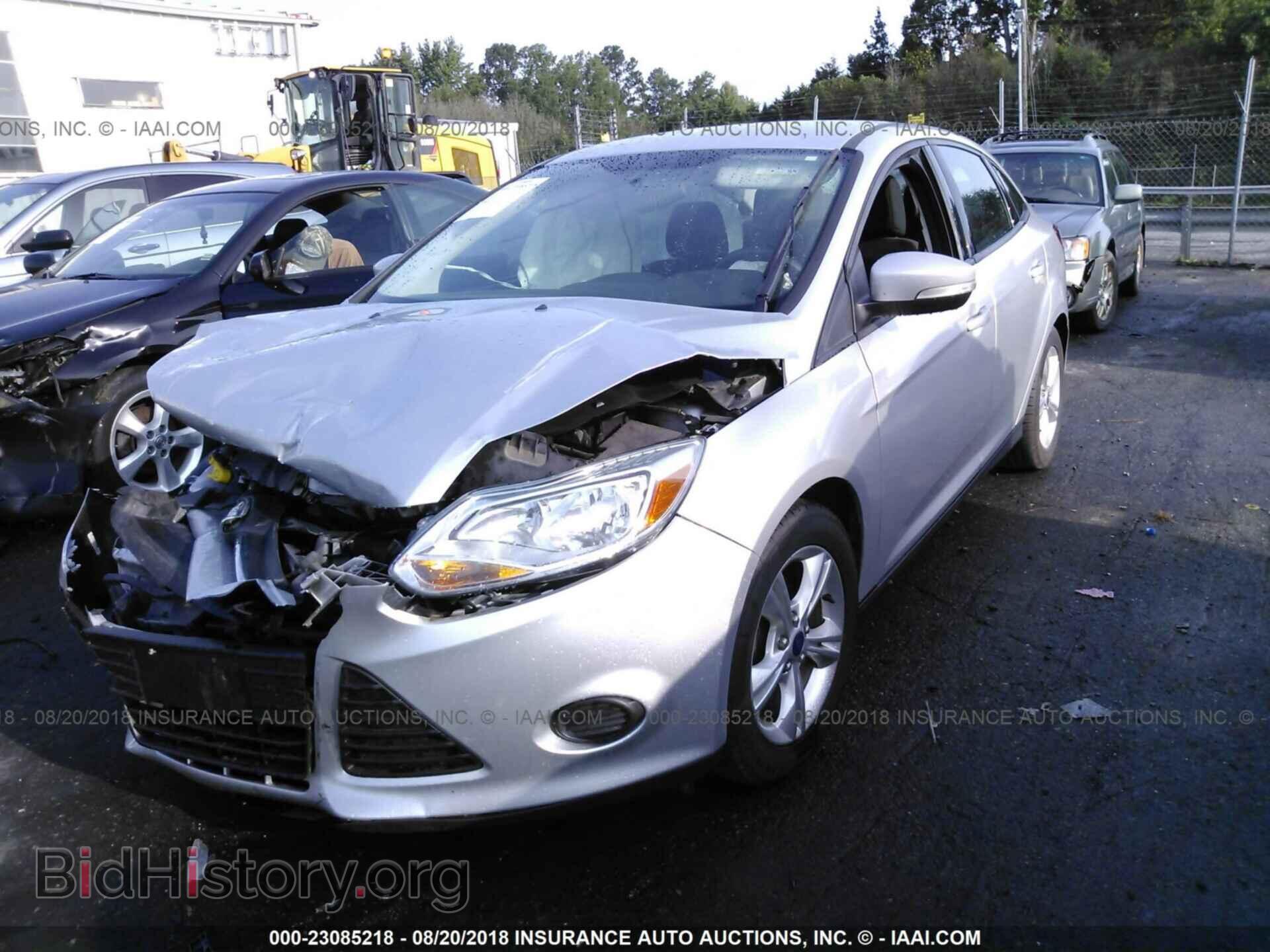 2014 Ford Focus - VIN: 1FADP3F20EL210701 - Фото 2