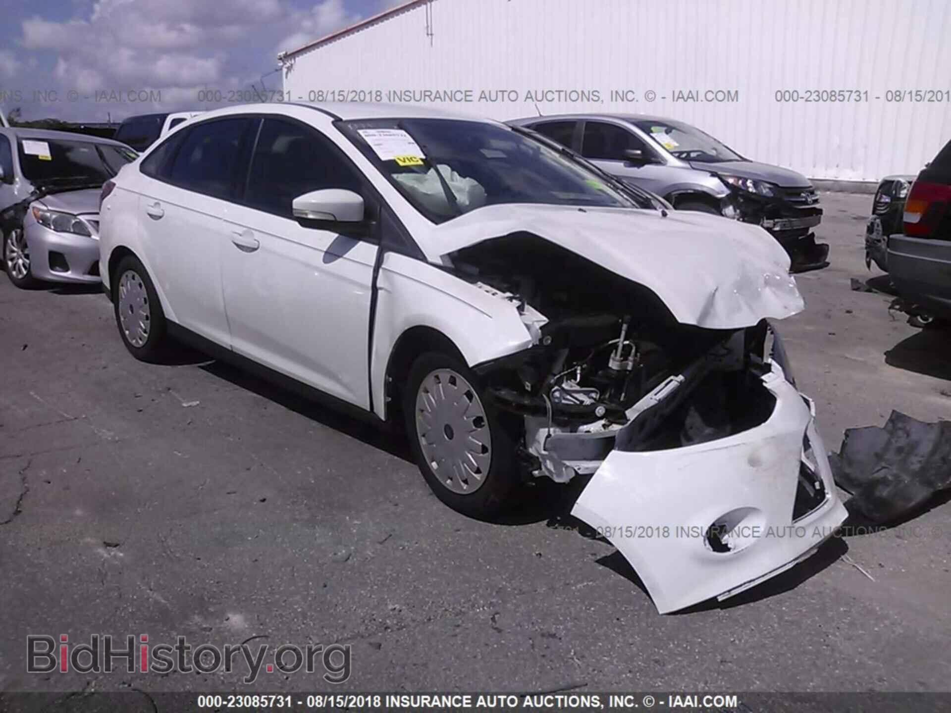 Photo 1FADP3F29EL203729 - Ford Focus 2014