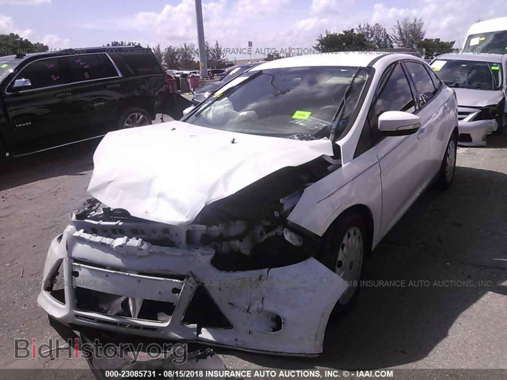 2014 Ford Focus - VIN: 1FADP3F29EL203729 - Фото 2
