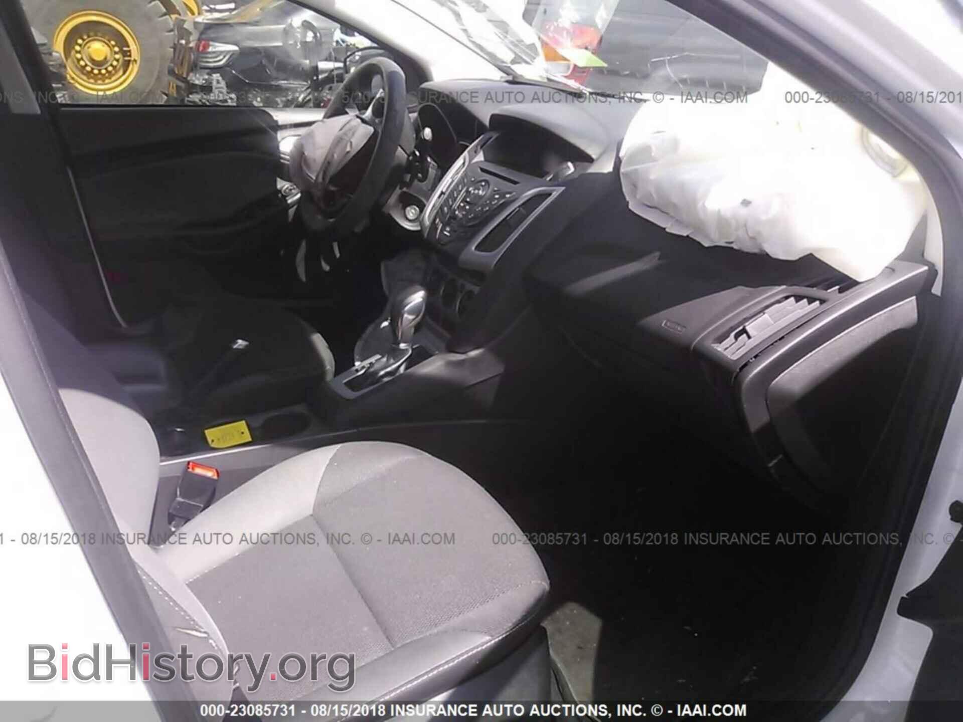 2014 Ford Focus - VIN: 1FADP3F29EL203729 - Фото 5
