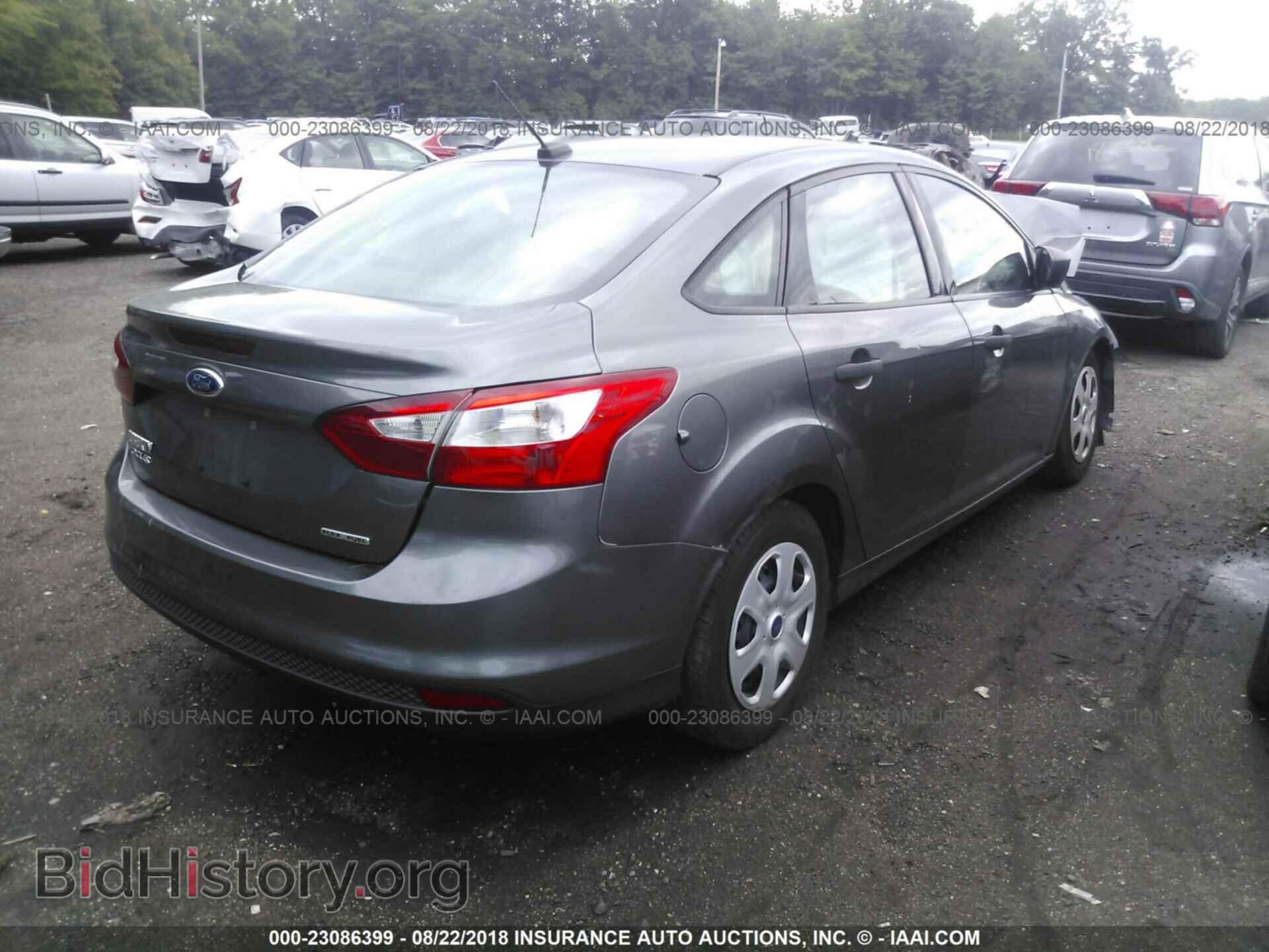 2014 Ford Focus - VIN: 1FADP3E21EL410701 - Photo 4
