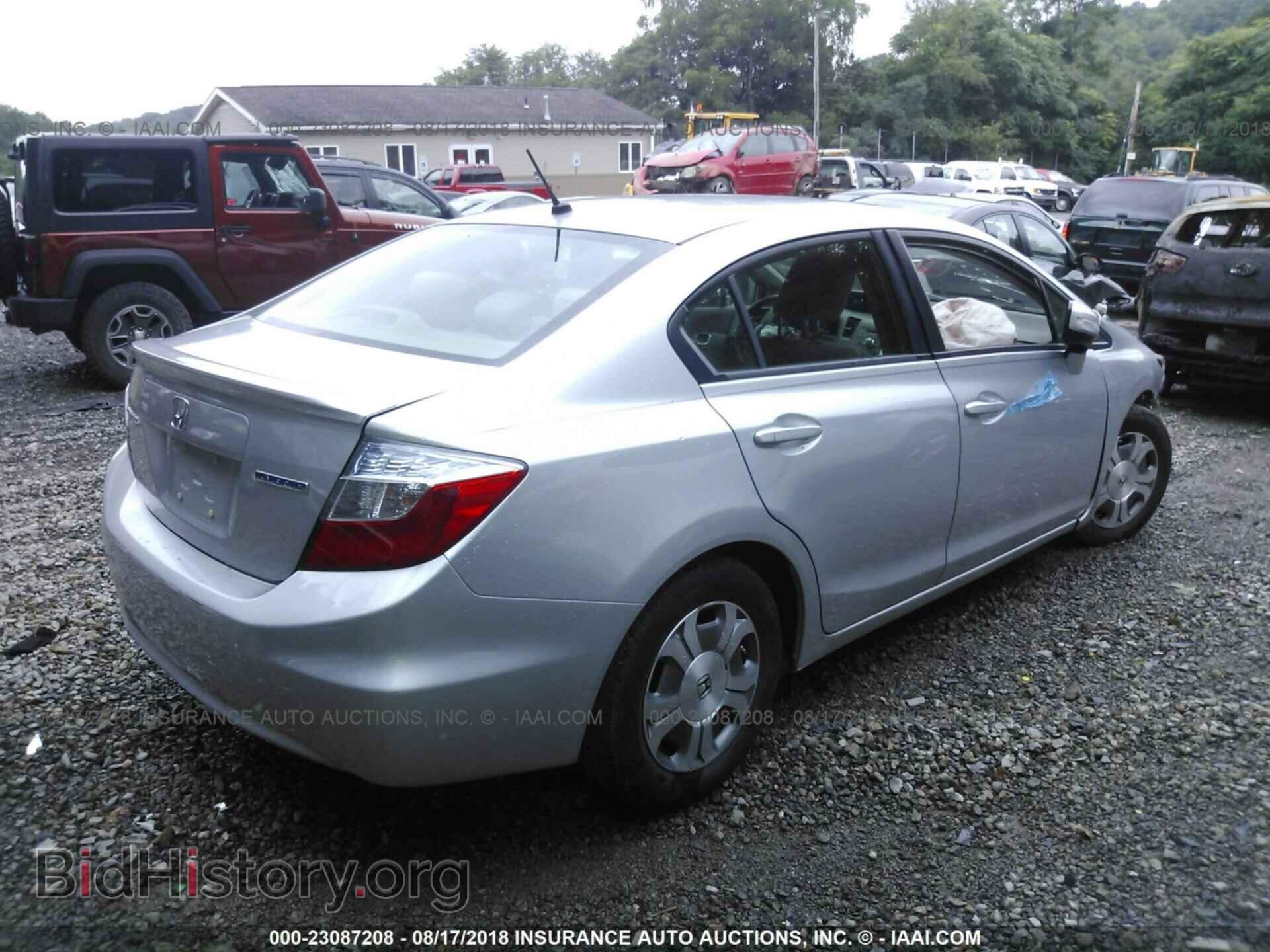 2012 Honda Civic - VIN: JHMFB4F26CS006929 - Photo 4