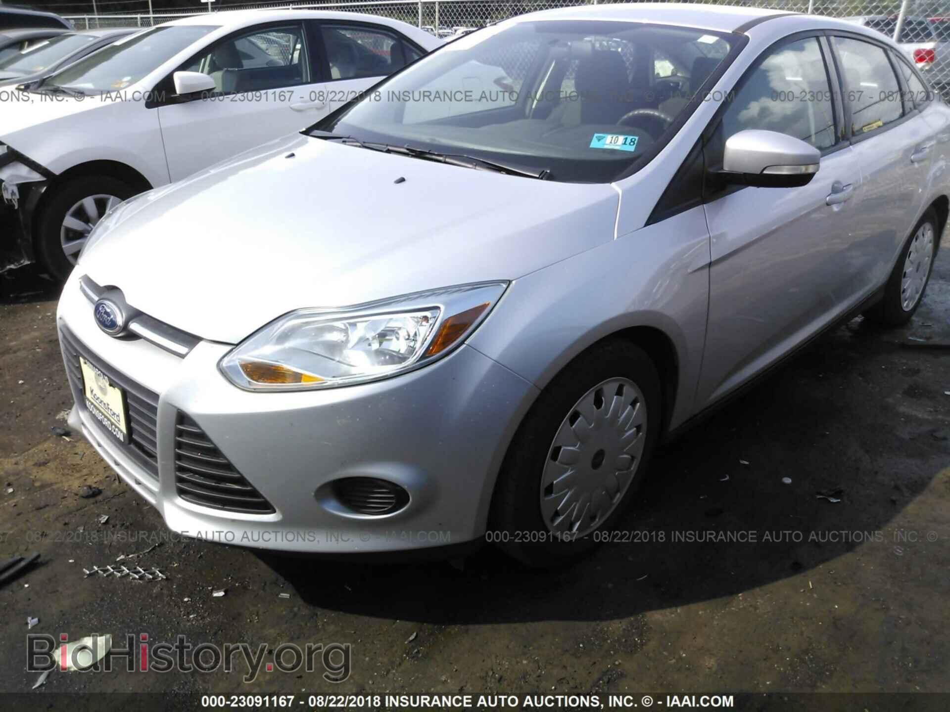 2014 Ford Focus - VIN: 1FADP3F24EL121911 - Фото 2