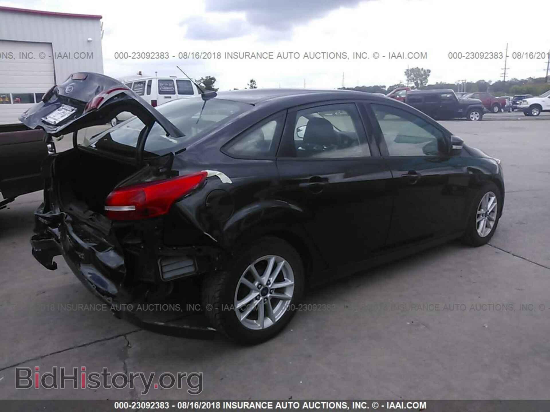 2015 Ford Focus - VIN: 1FADP3F29FL357407 - Photo 4