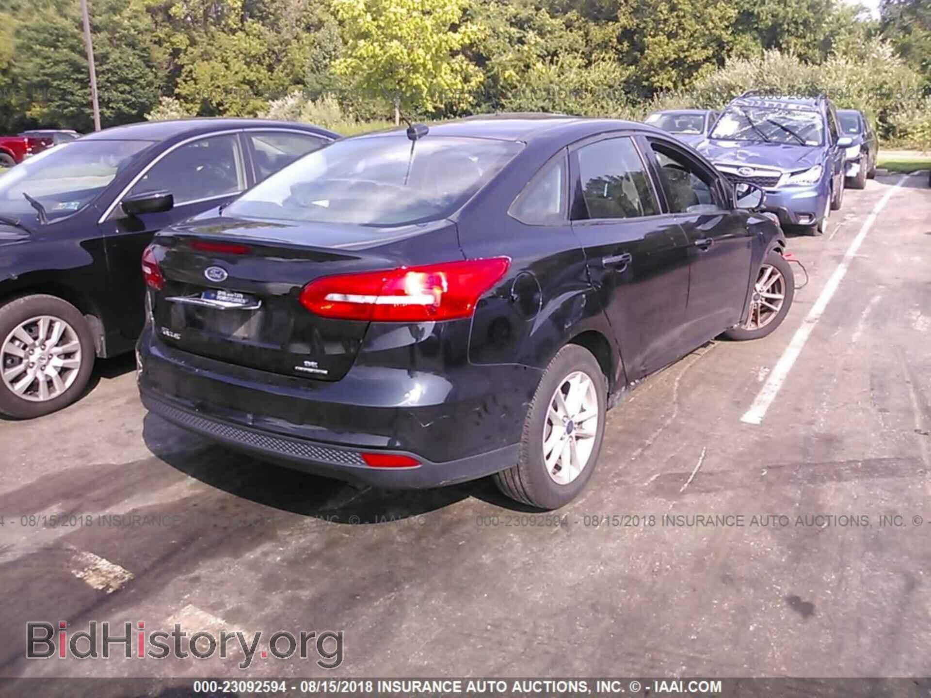 2016 Ford Focus - VIN: 1FADP3F29GL263643 - Photo 4