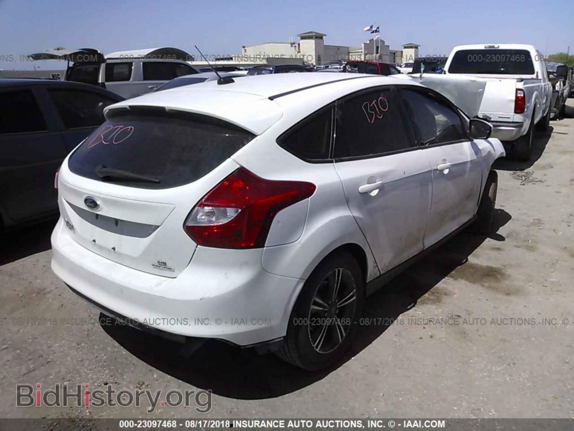 2014 Ford Focus - VIN: 1FADP3K22EL381410 - Фото 4