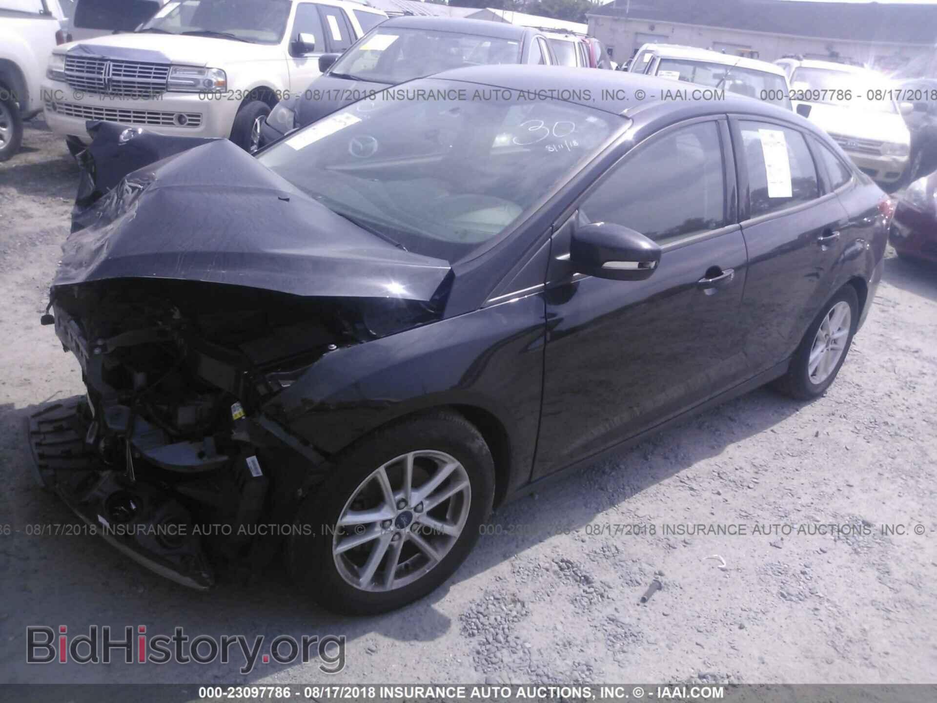 2015 FORD FOCUS - VIN: 1FADP3F29FL291473 - Photo 2