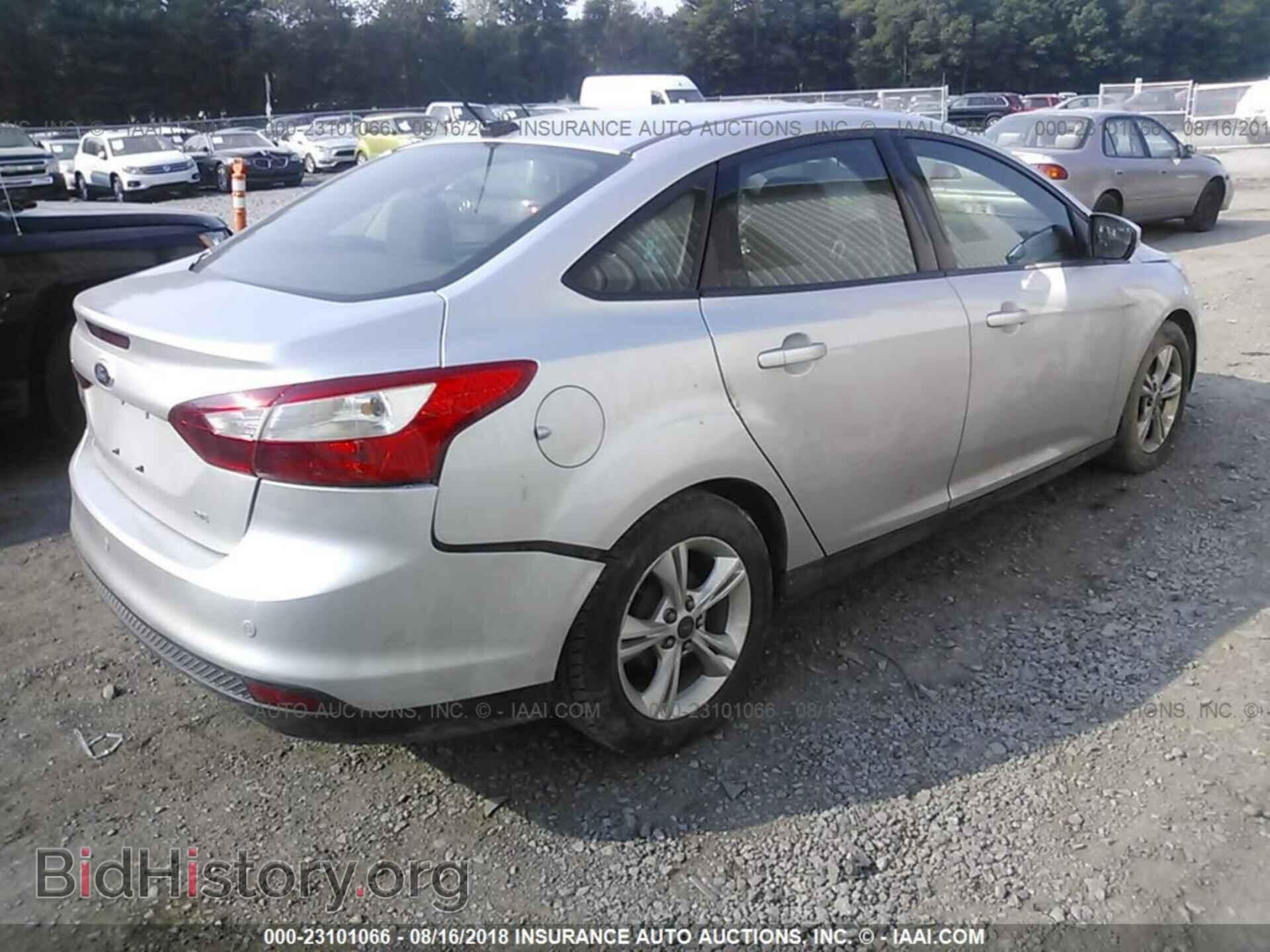 2014 Ford Focus - VIN: 1FADP3F29EL243454 - Фото 4