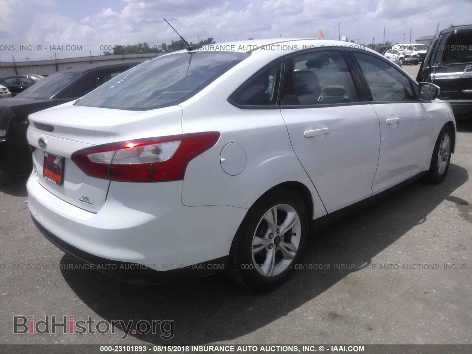 2014 Ford Focus - VIN: 1FADP3F27EL321018 - Photo 4