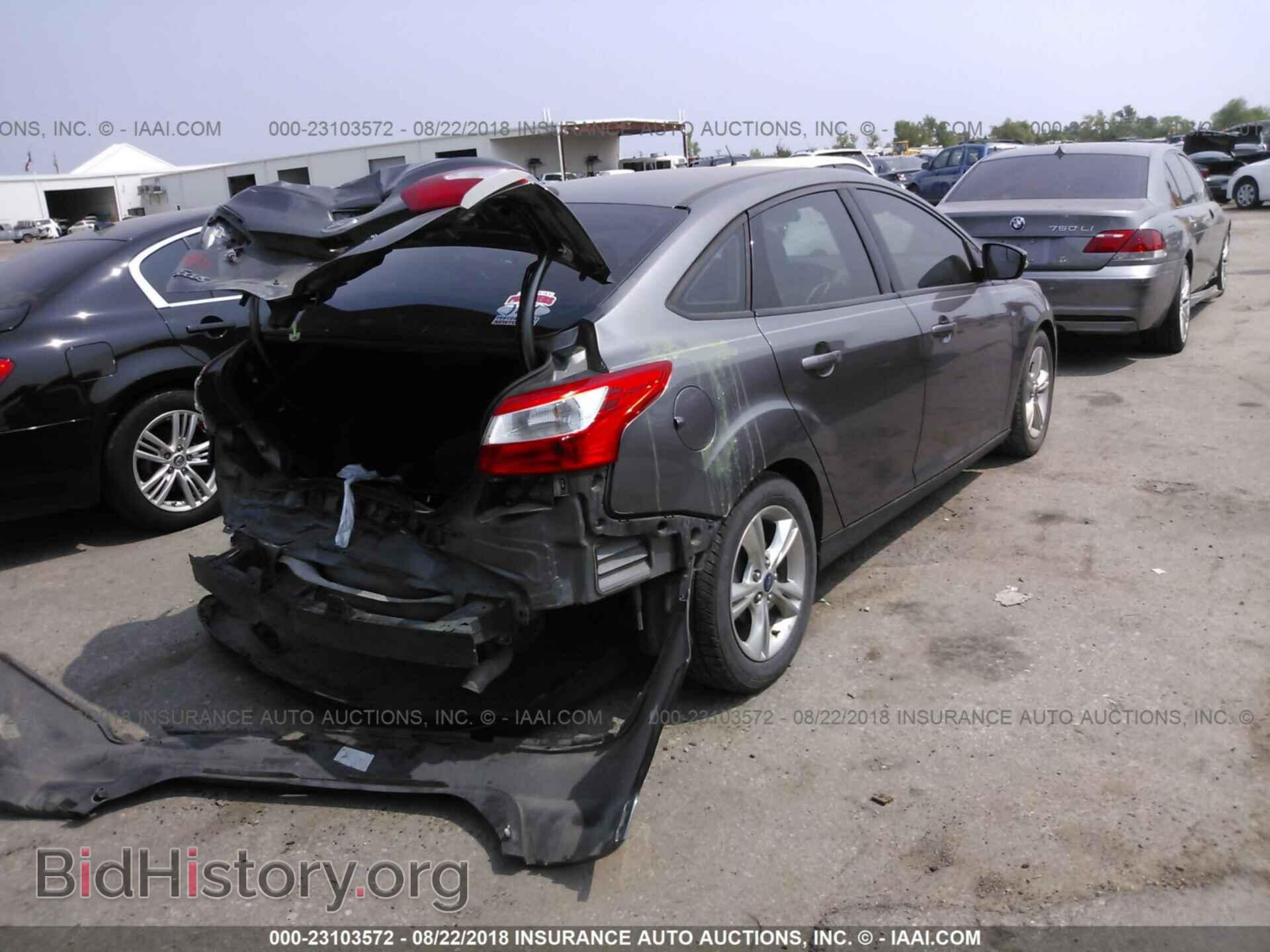 2014 Ford Focus - VIN: 1FADP3F21EL163419 - Фото 4