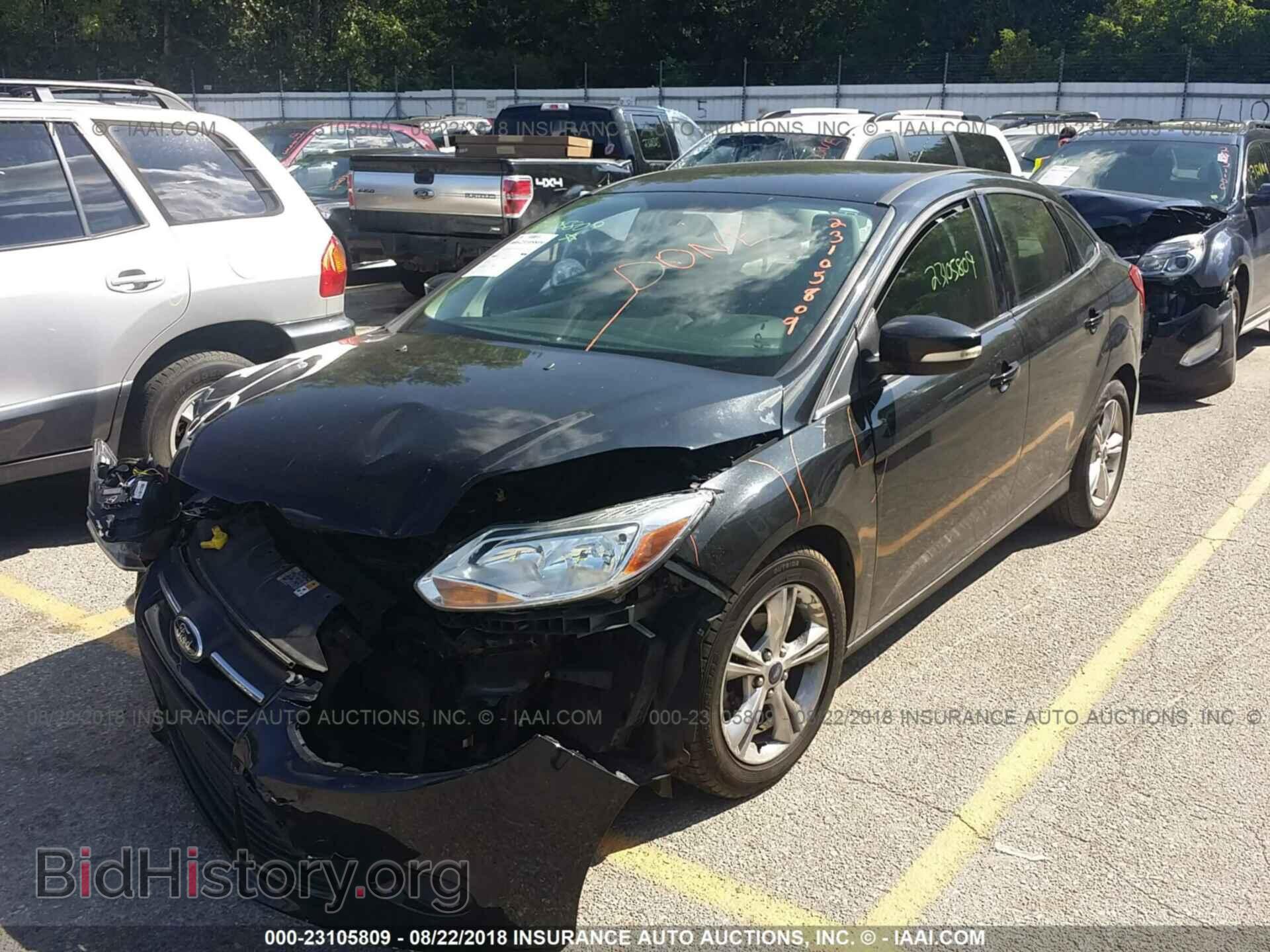 2014 Ford Focus - VIN: 1FADP3F21EL292745 - Photo 2