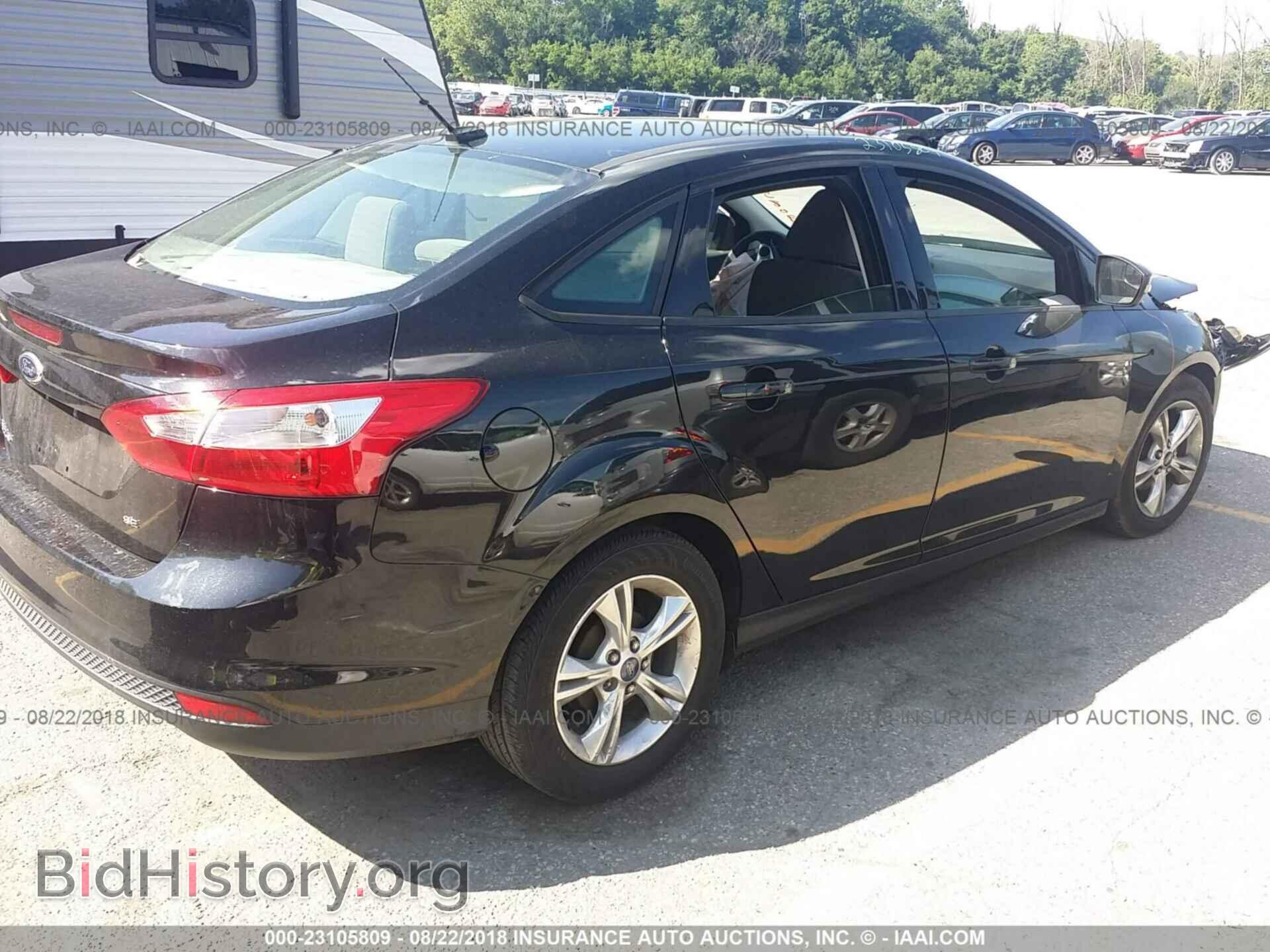 2014 Ford Focus - VIN: 1FADP3F21EL292745 - Photo 4
