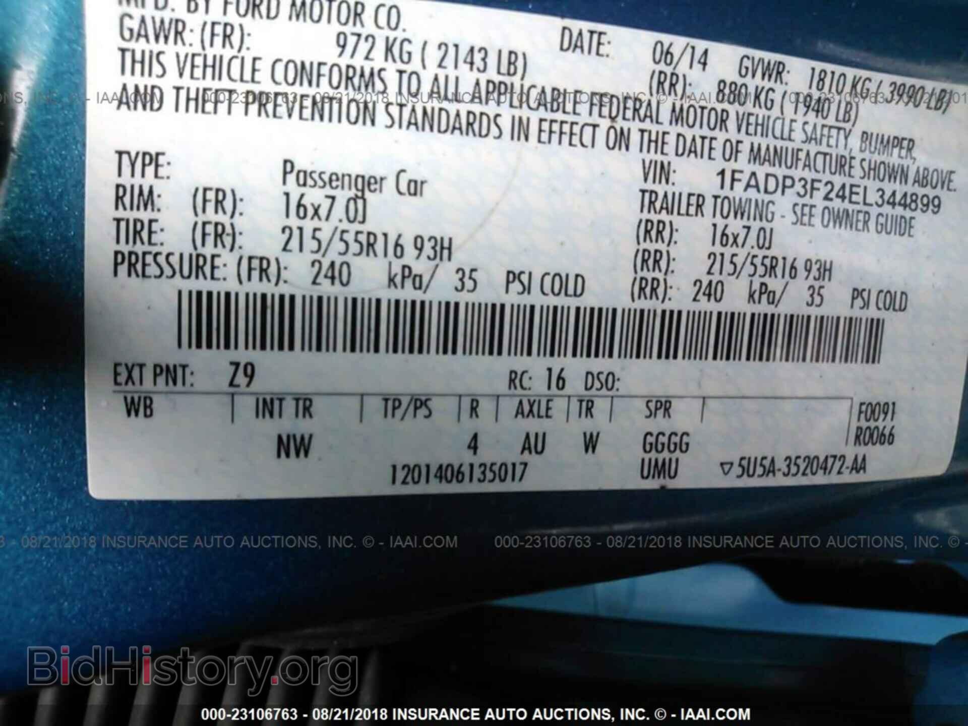 2014 Ford Focus - VIN: 1FADP3F24EL344899 - Photo 9