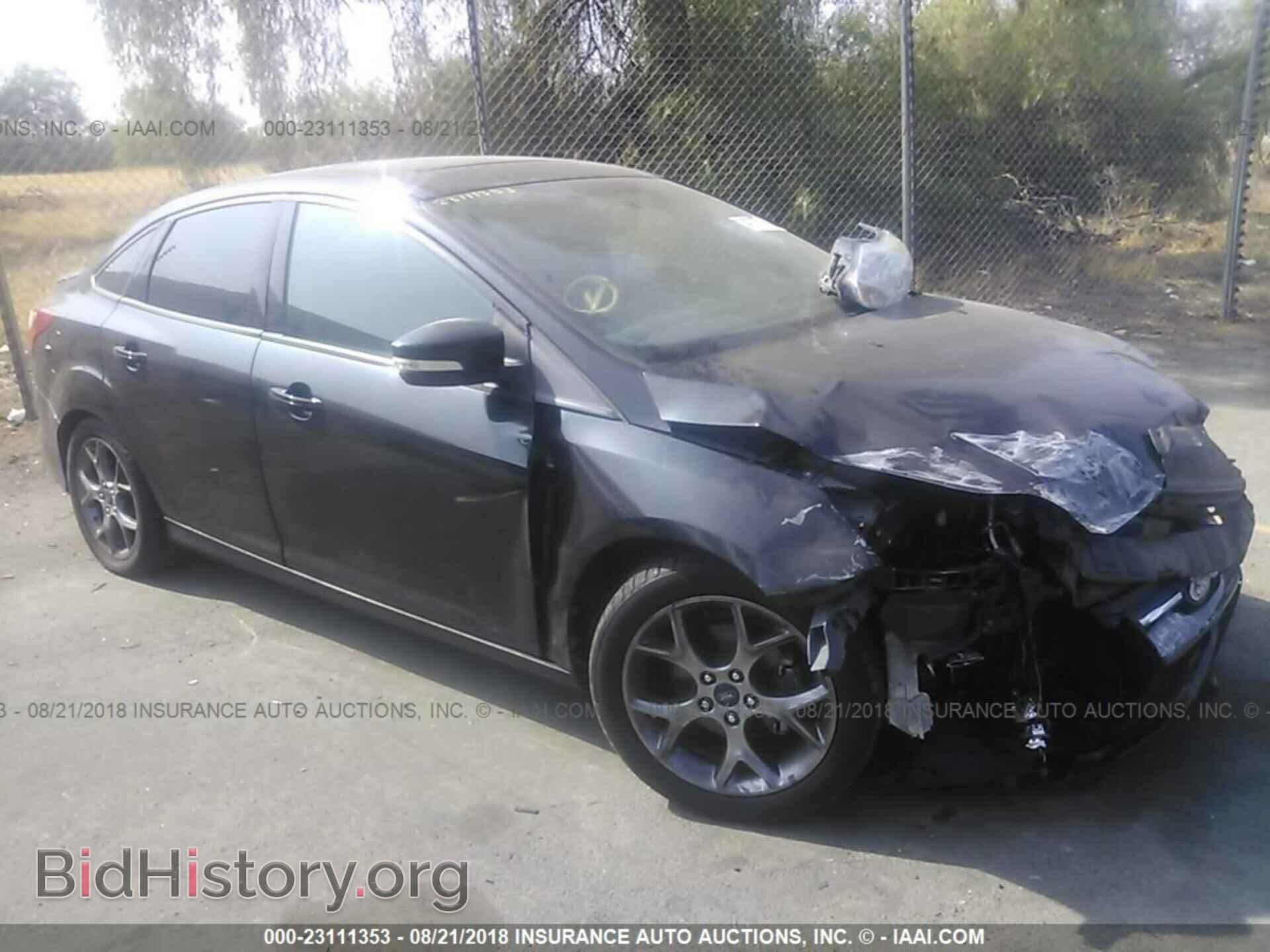 Фотография 1FADP3F23EL219277 - Ford Focus 2014