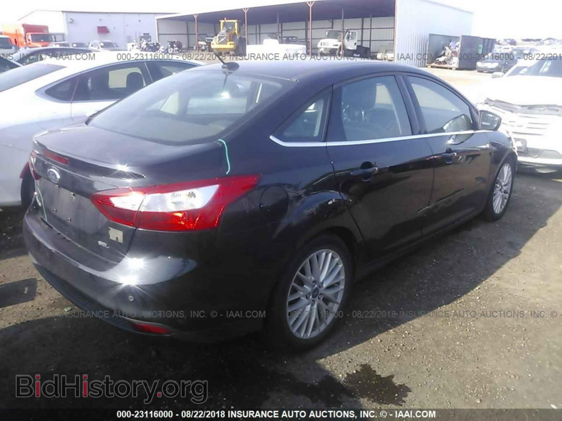 2012 Ford Focus - VIN: 1FAHP3H27CL129996 - Photo 4