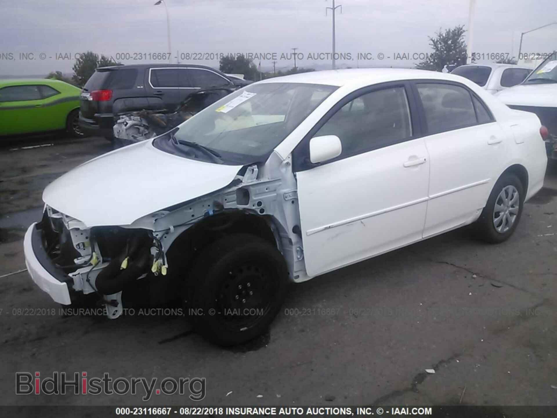 2011 Toyota Corolla - VIN: JTDBU4EE7B9127495 - Фото 2