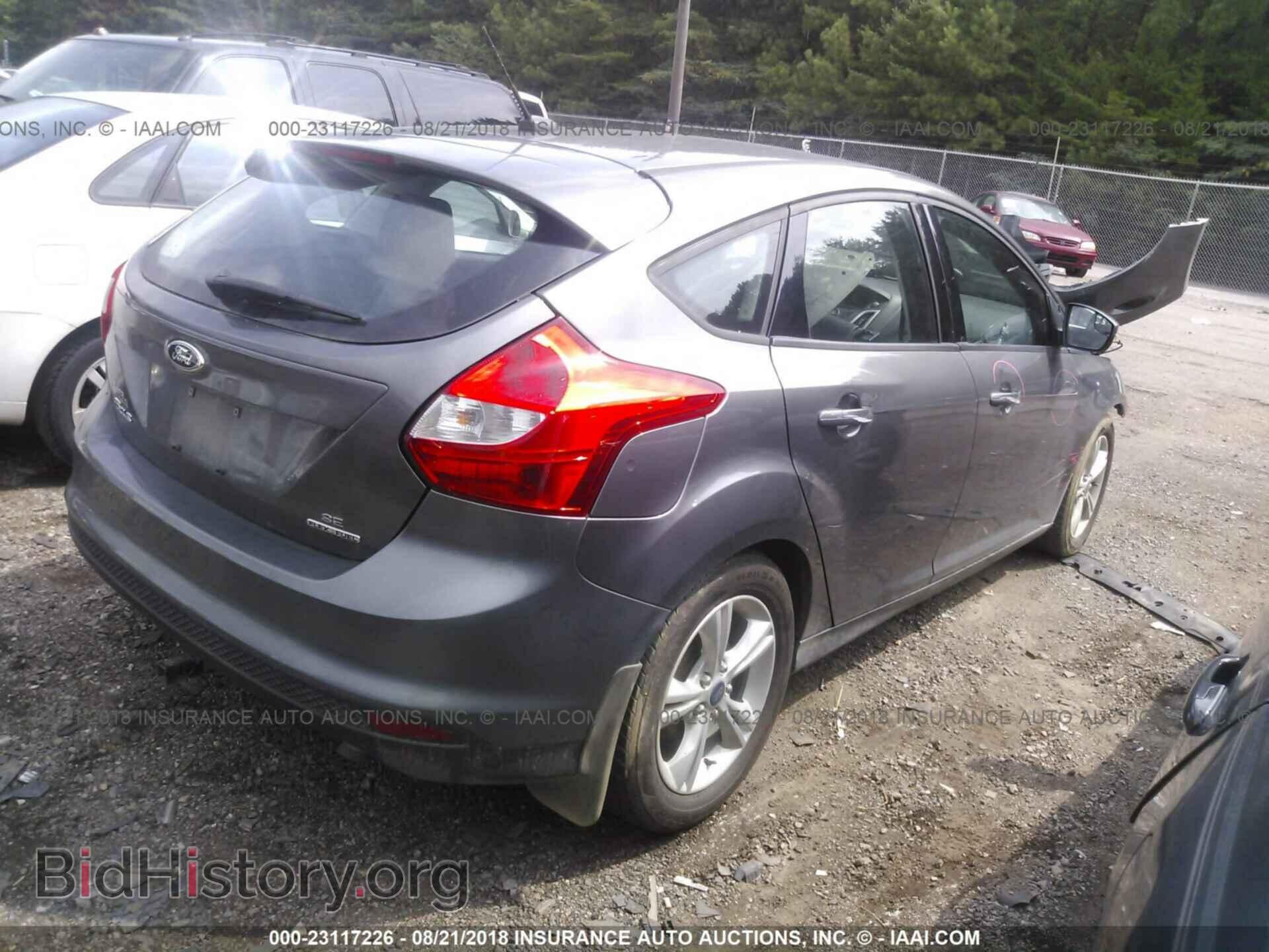 2014 Ford Focus - VIN: 1FADP3K21EL304589 - Photo 4