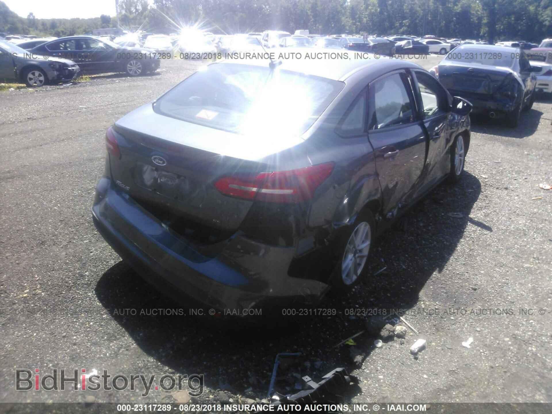 2017 Ford Focus - VIN: 1FADP3F2XHL306873 - Photo 4