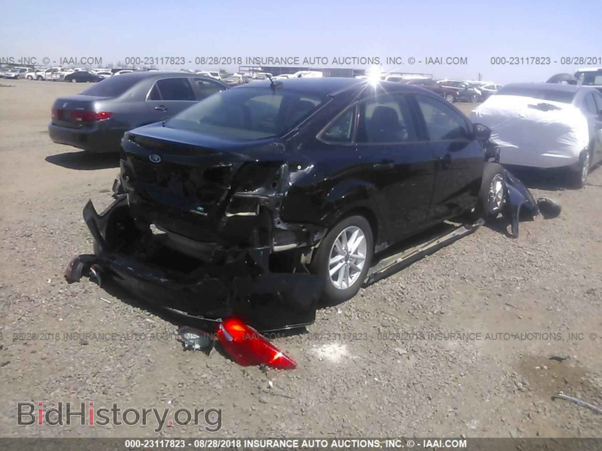 2015 Ford Focus - VIN: 1FADP3F27FL314264 - Photo 4