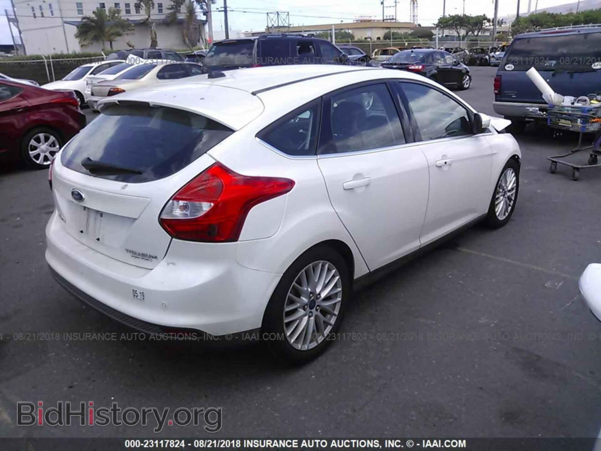 2014 Ford Focus - VIN: 1FADP3N21EL199662 - Photo 4