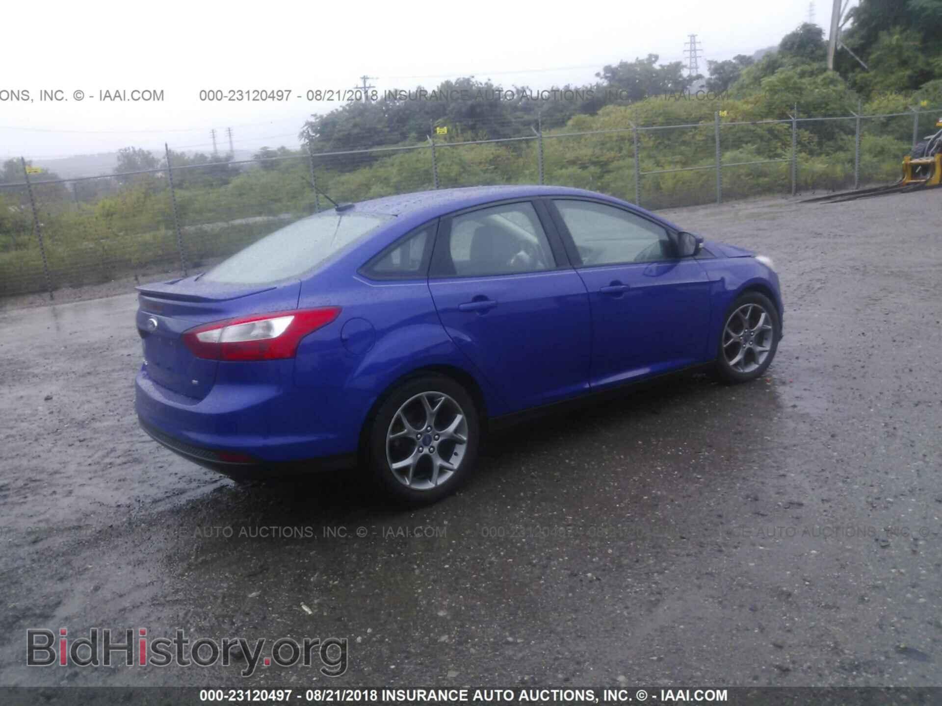 2014 Ford Focus - VIN: 1FADP3F26EL310298 - Фото 4