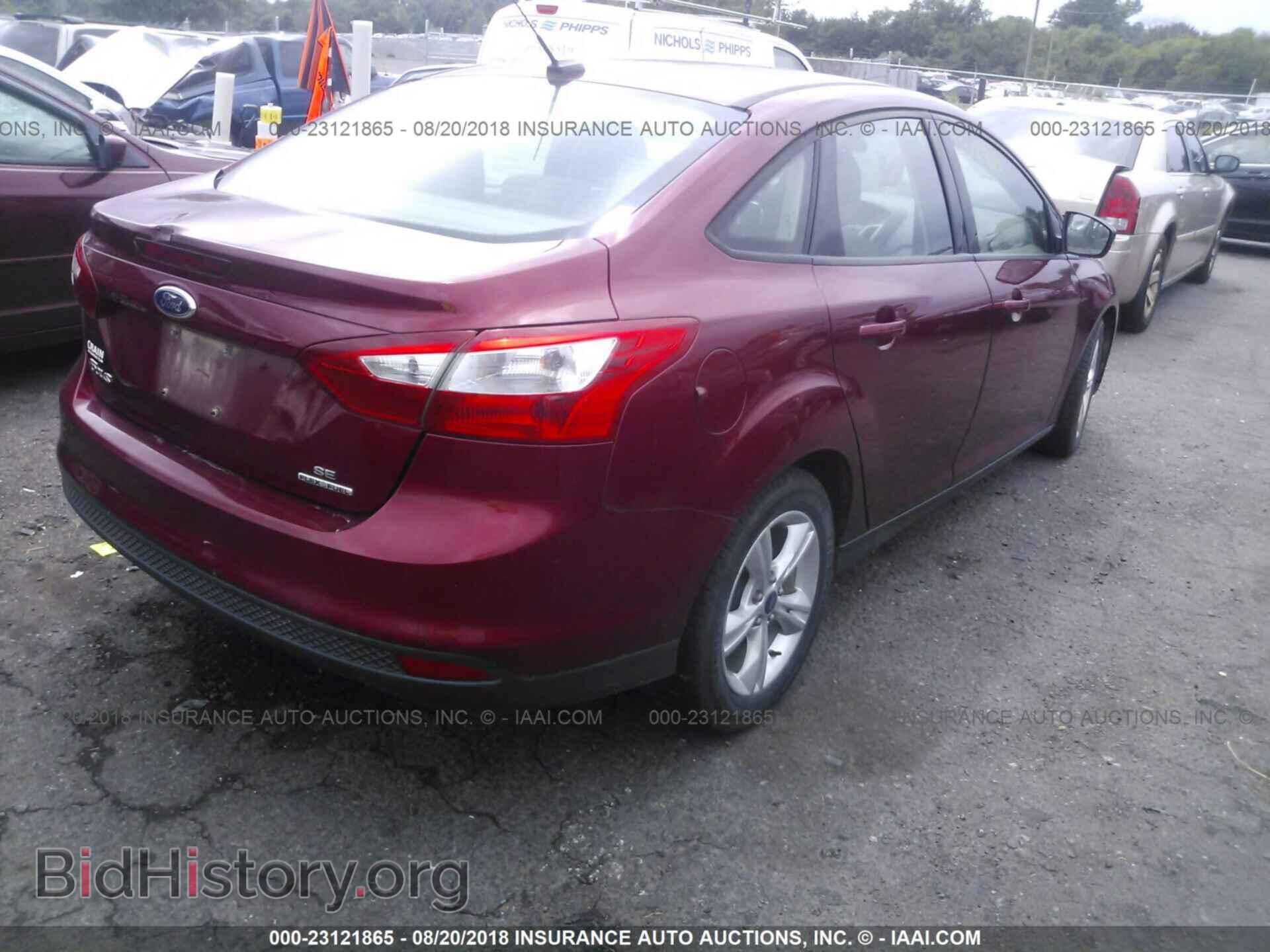 2013 Ford Focus - VIN: 1FADP3F26DL129555 - Photo 4