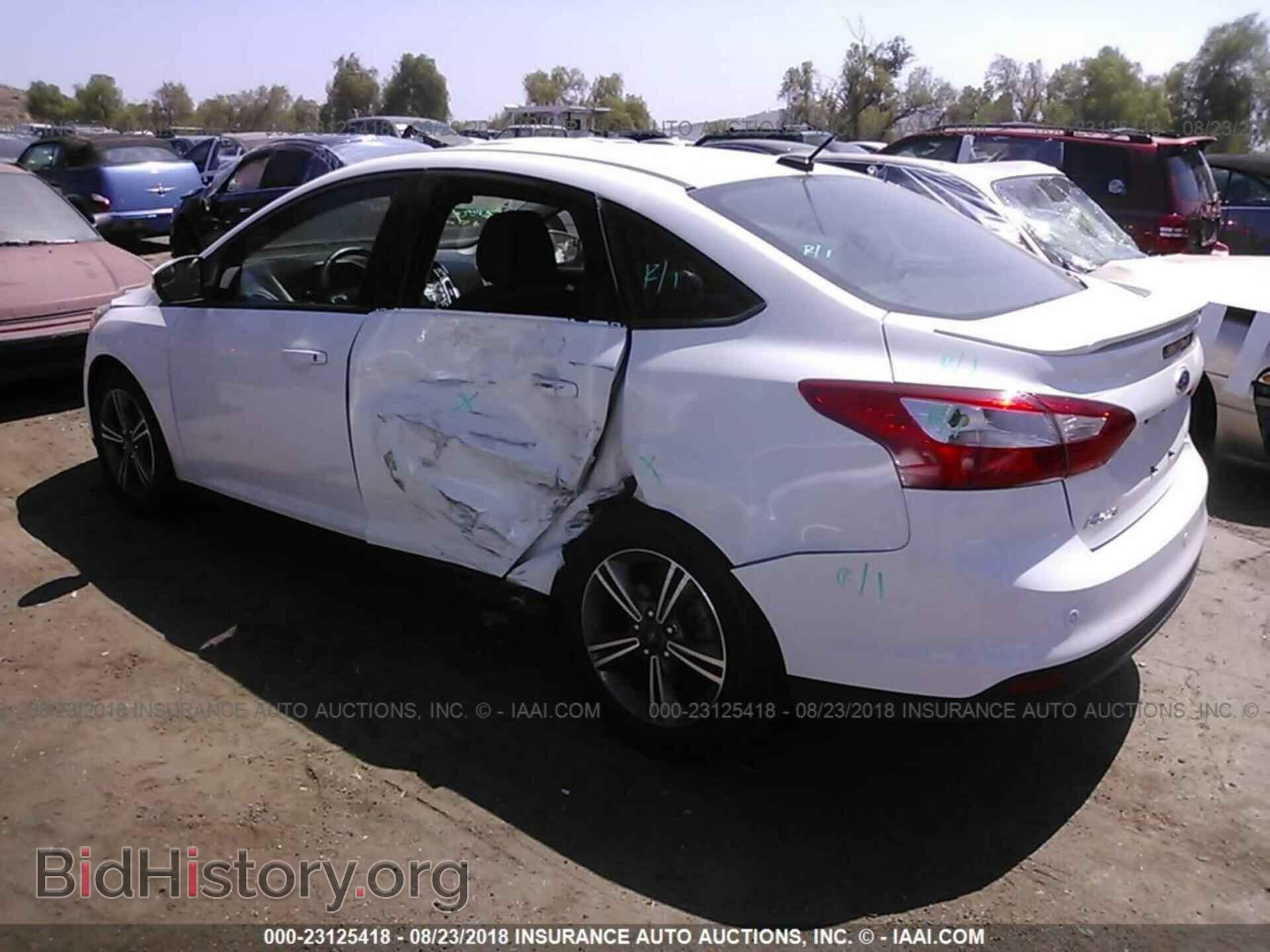 2014 Ford Focus - VIN: 1FADP3F20EL144537 - Фото 3