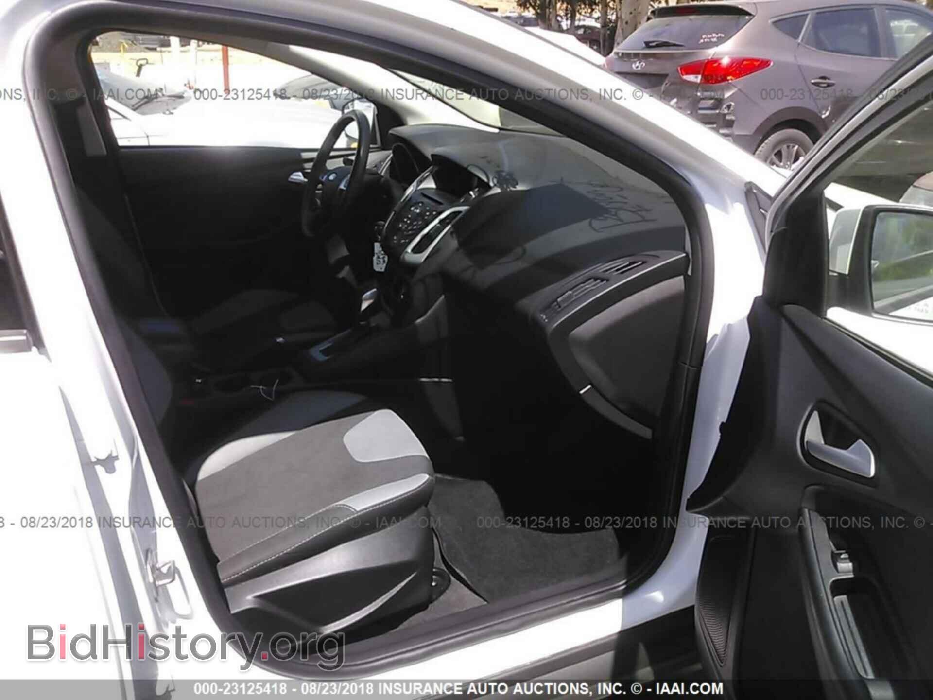 2014 Ford Focus - VIN: 1FADP3F20EL144537 - Фото 5