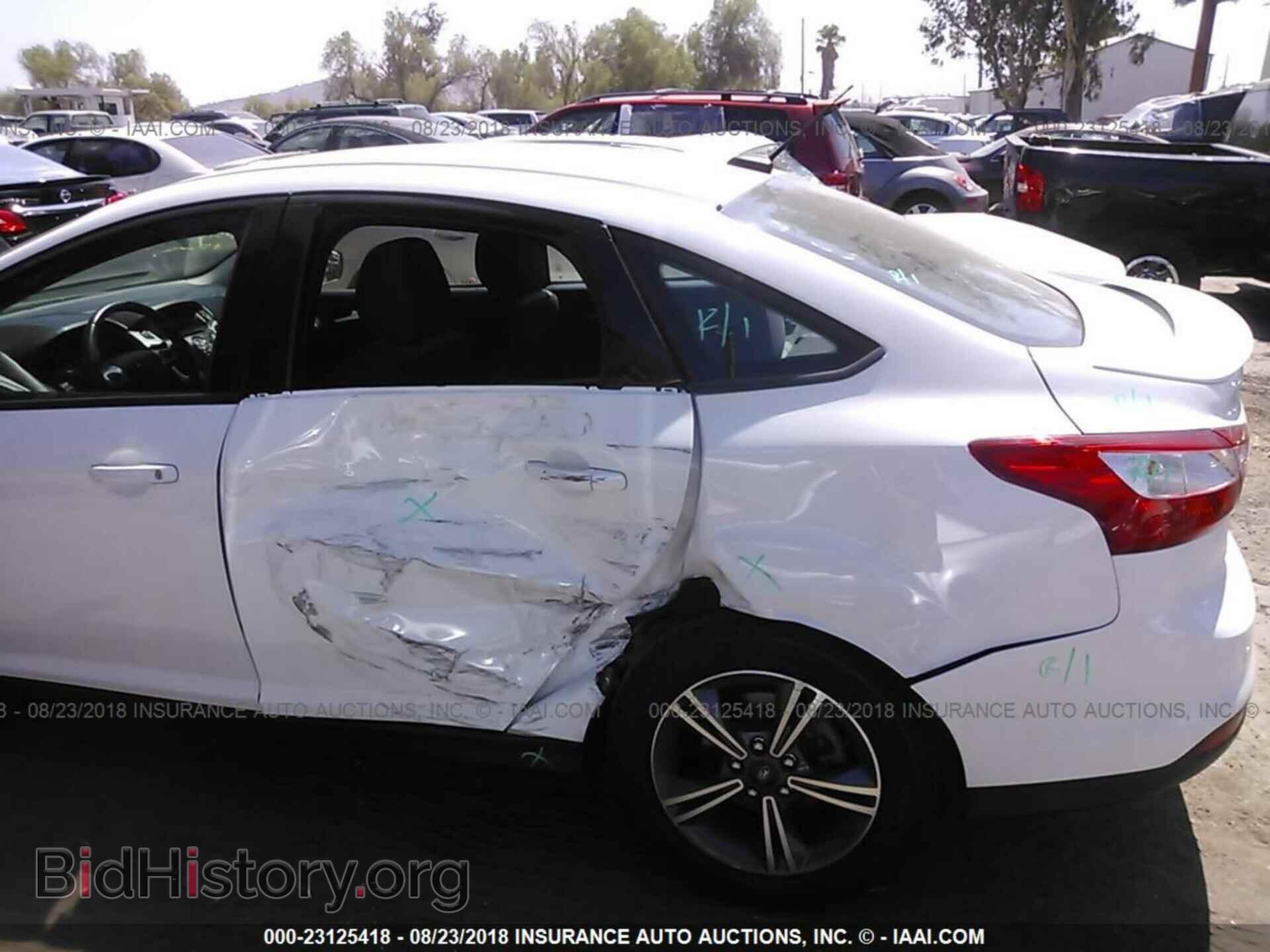 2014 Ford Focus - VIN: 1FADP3F20EL144537 - Фото 6