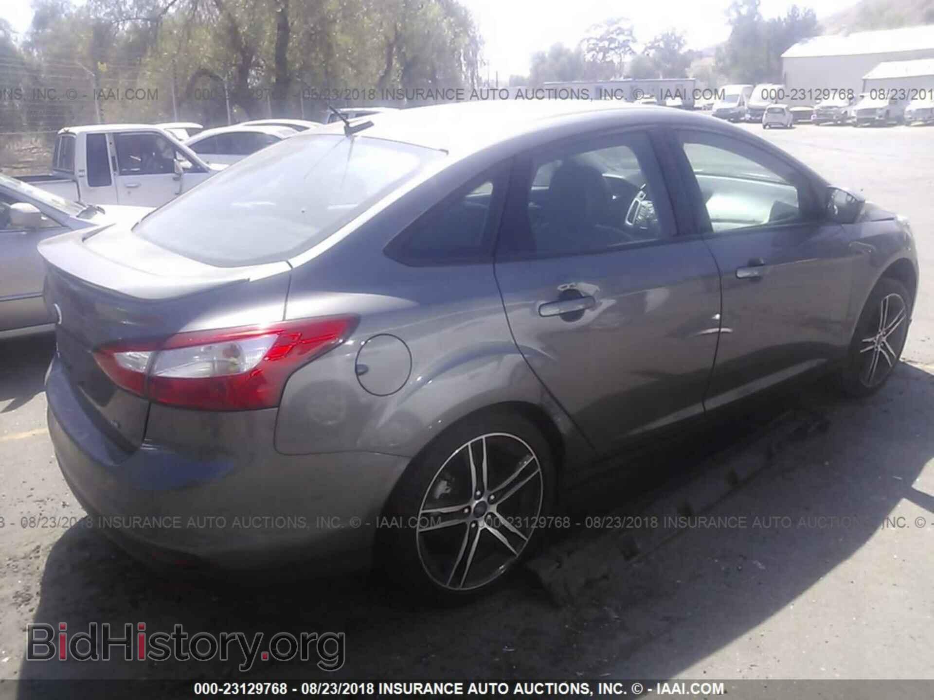 2014 Ford Focus - VIN: 1FADP3F2XEL247660 - Фото 4