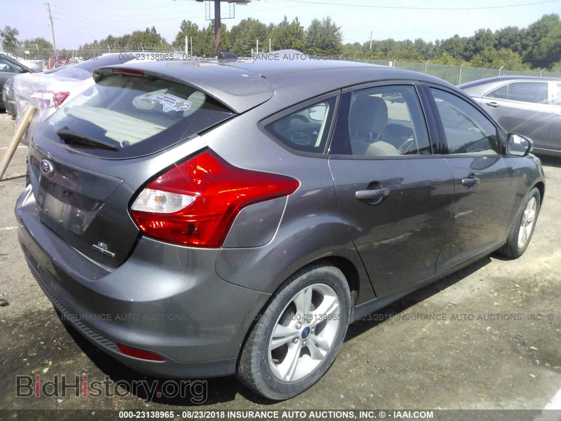 2014 Ford Focus - VIN: 1FADP3K27EL402932 - Photo 4