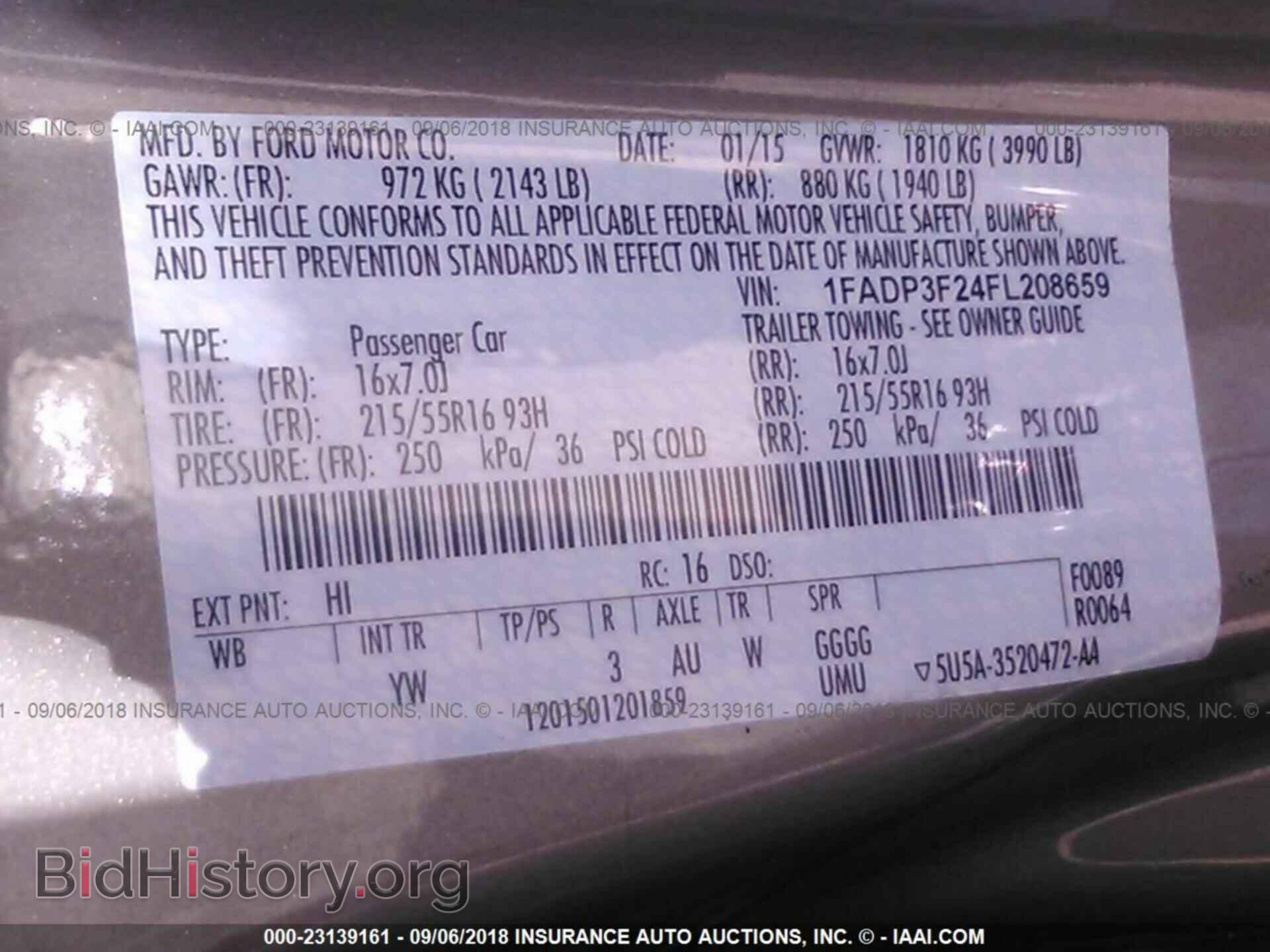2015 Ford Focus - VIN: 1FADP3F24FL208659 - Photo 9