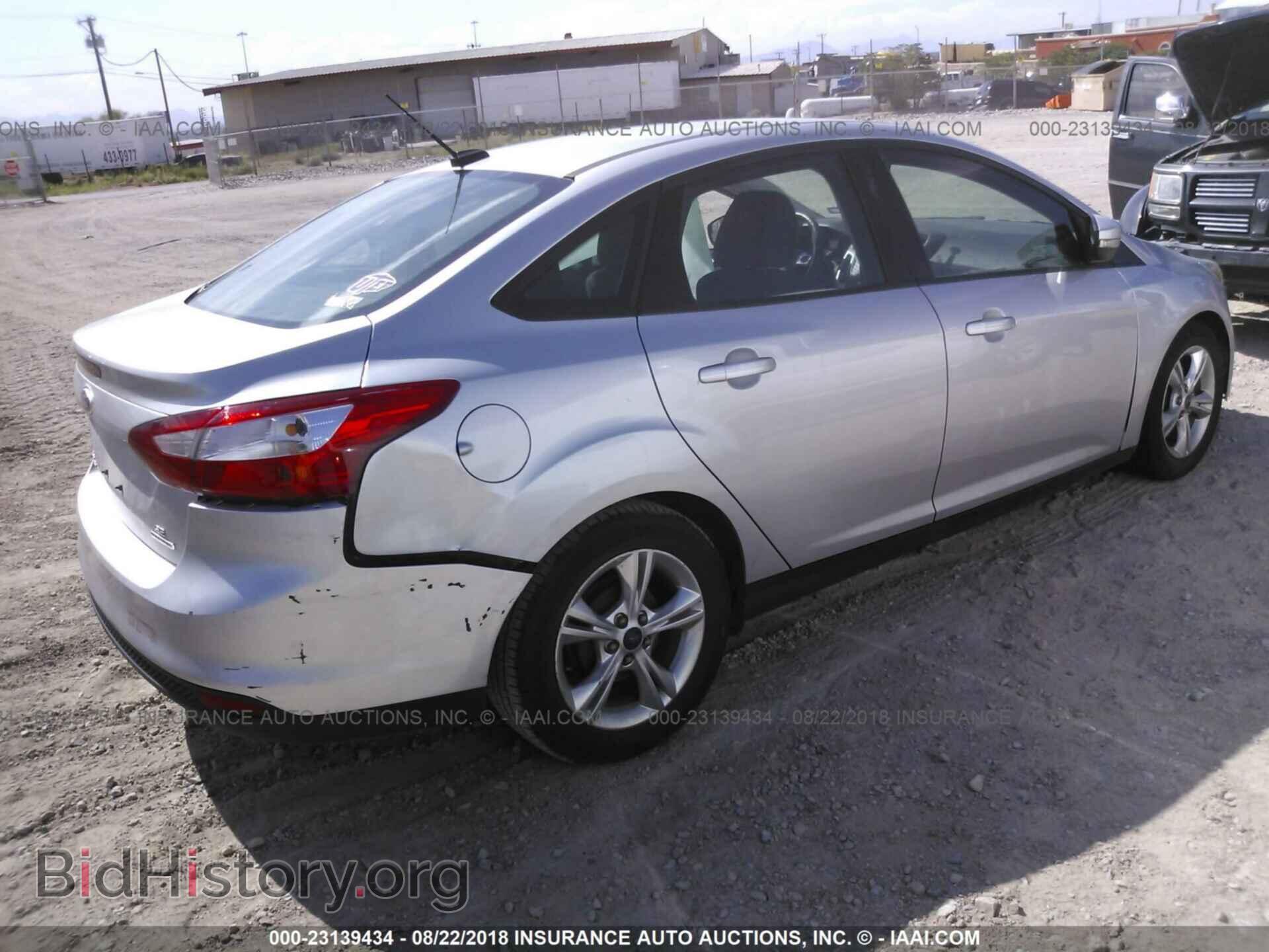 2014 Ford Focus - VIN: 1FADP3F28EL246653 - Фото 4