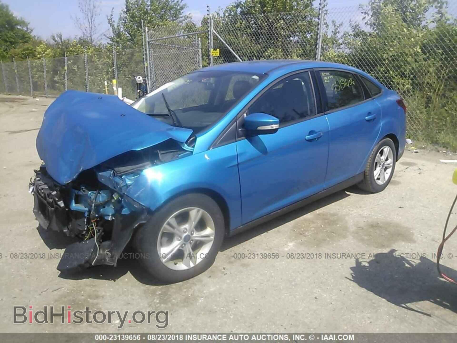 2014 Ford Focus - VIN: 1FADP3F22EL449019 - Фото 2