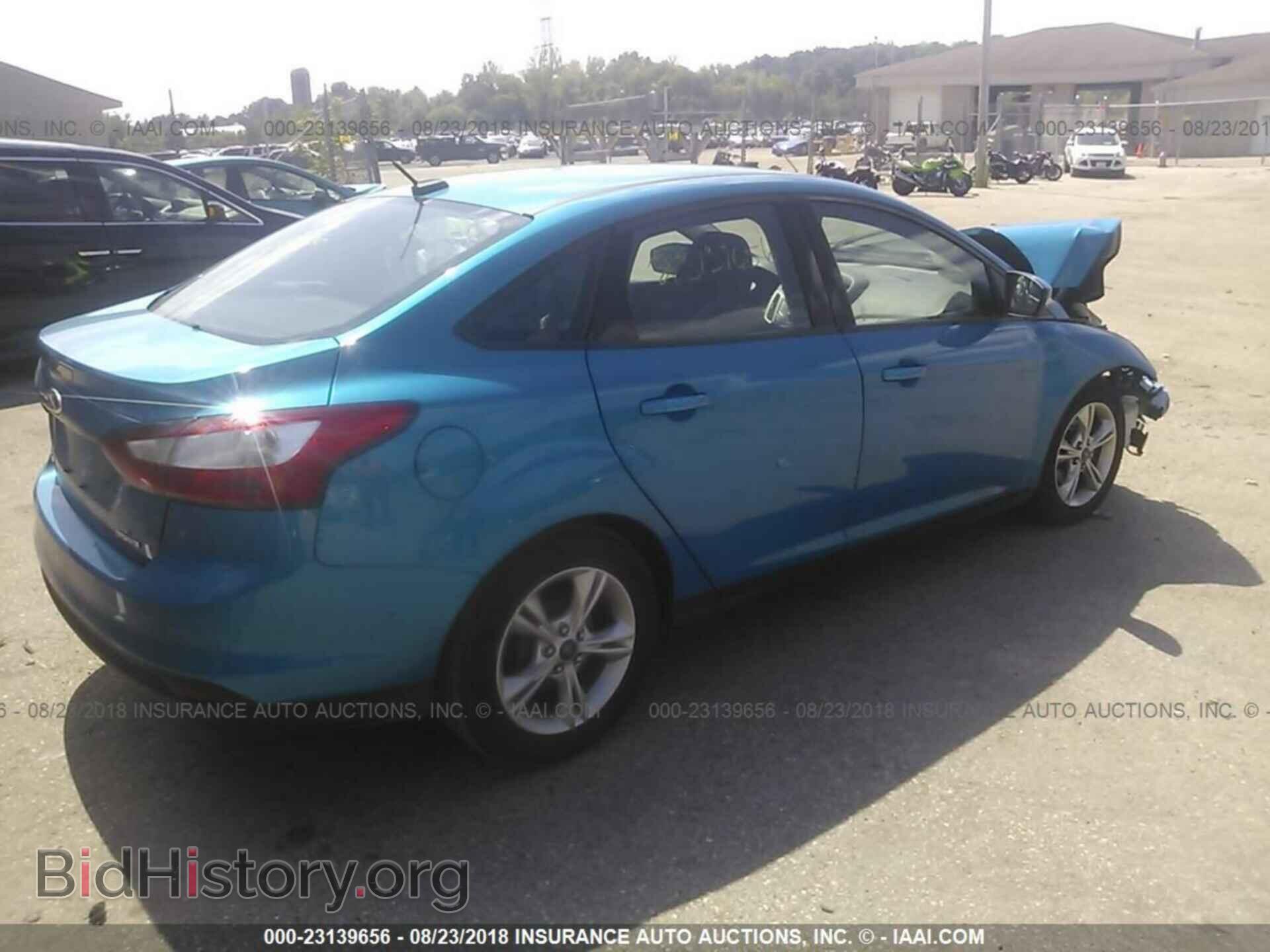 2014 Ford Focus - VIN: 1FADP3F22EL449019 - Фото 4