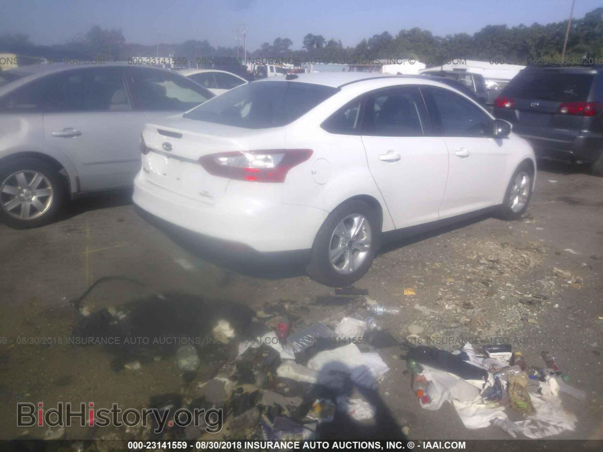 2014 Ford Focus - VIN: 1FADP3F27EL369098 - Photo 4