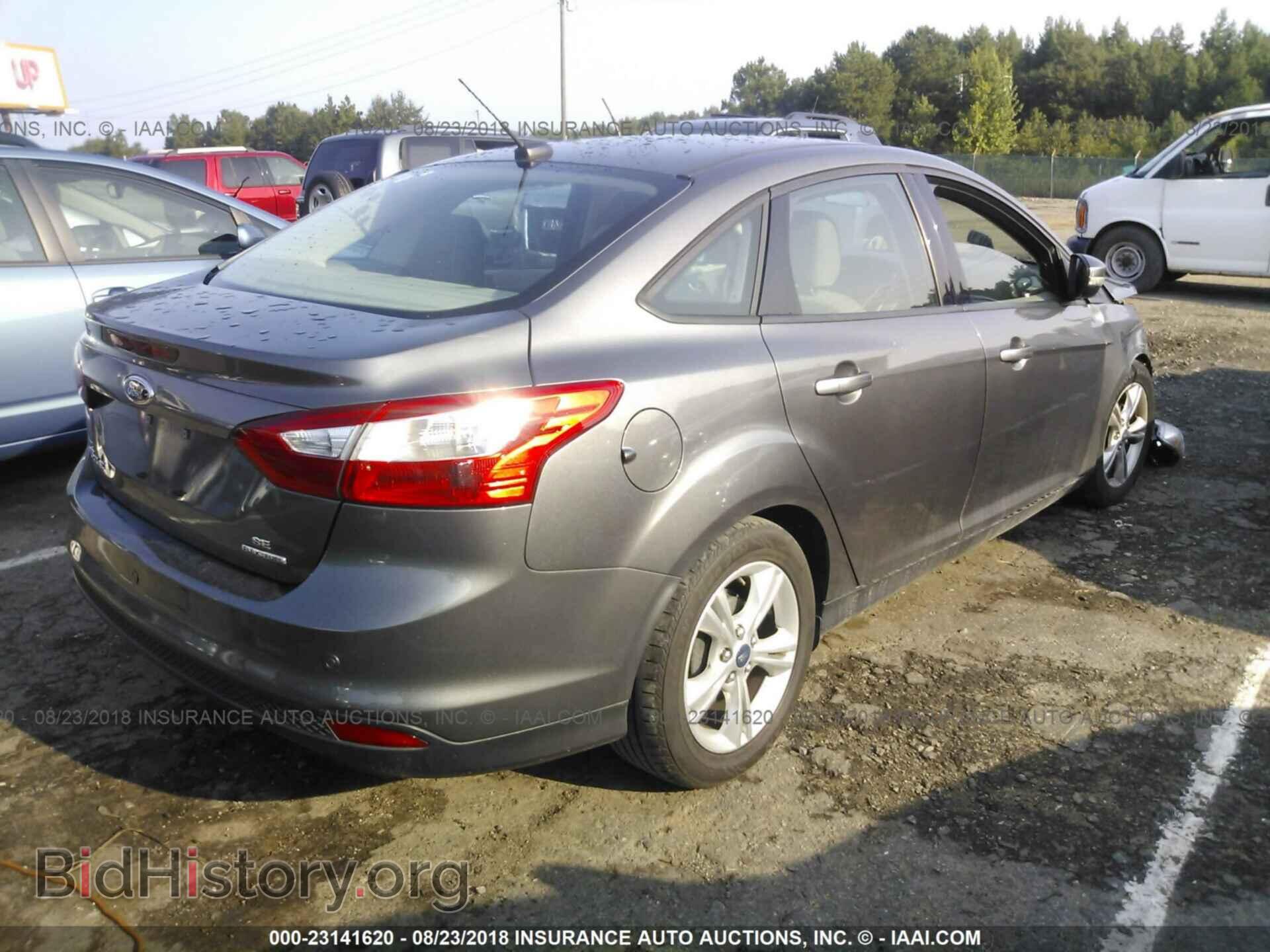 2014 Ford Focus - VIN: 1FADP3F20EL172774 - Photo 4