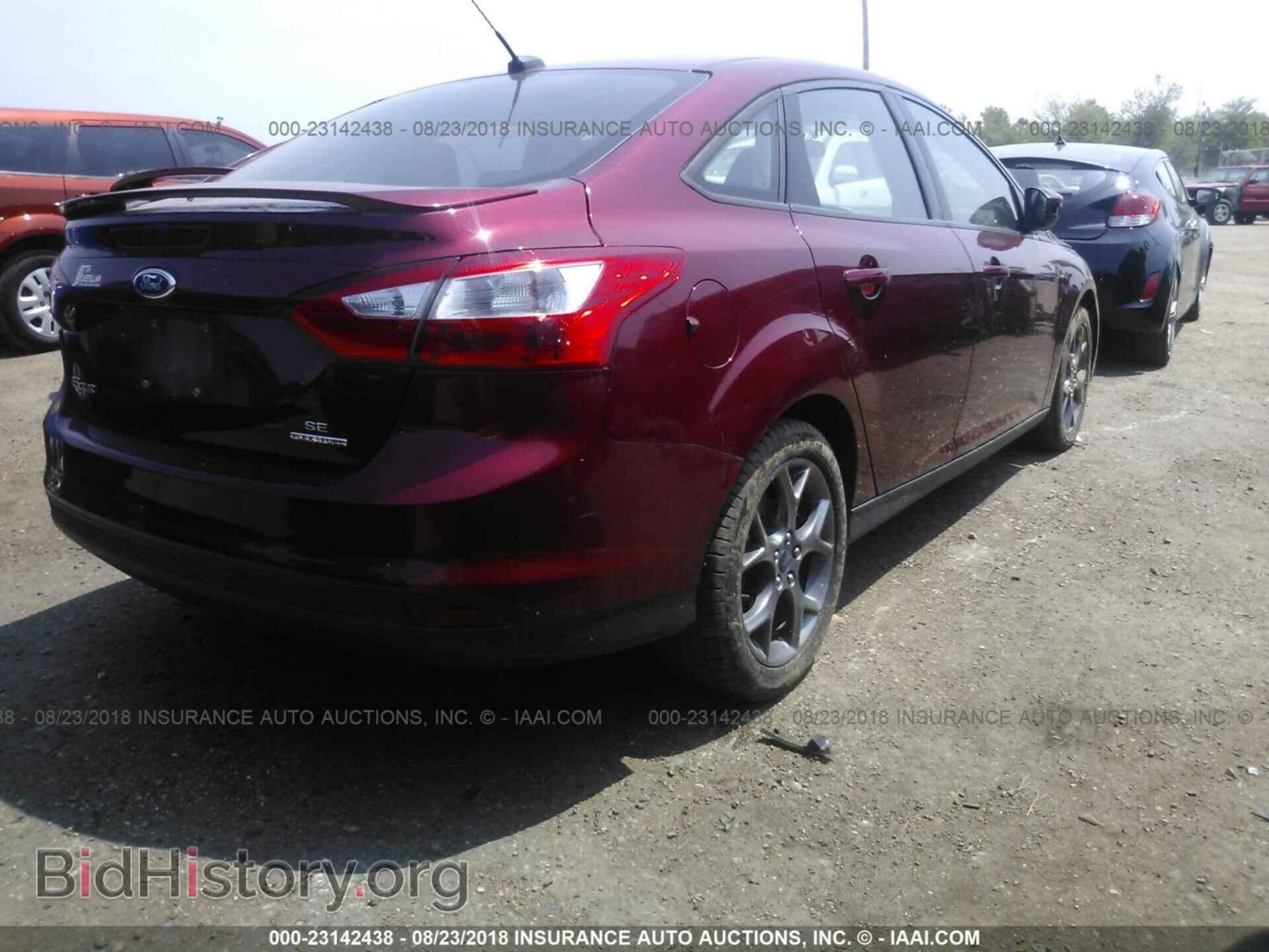2014 Ford Focus - VIN: 1FADP3F2XEL251854 - Photo 4