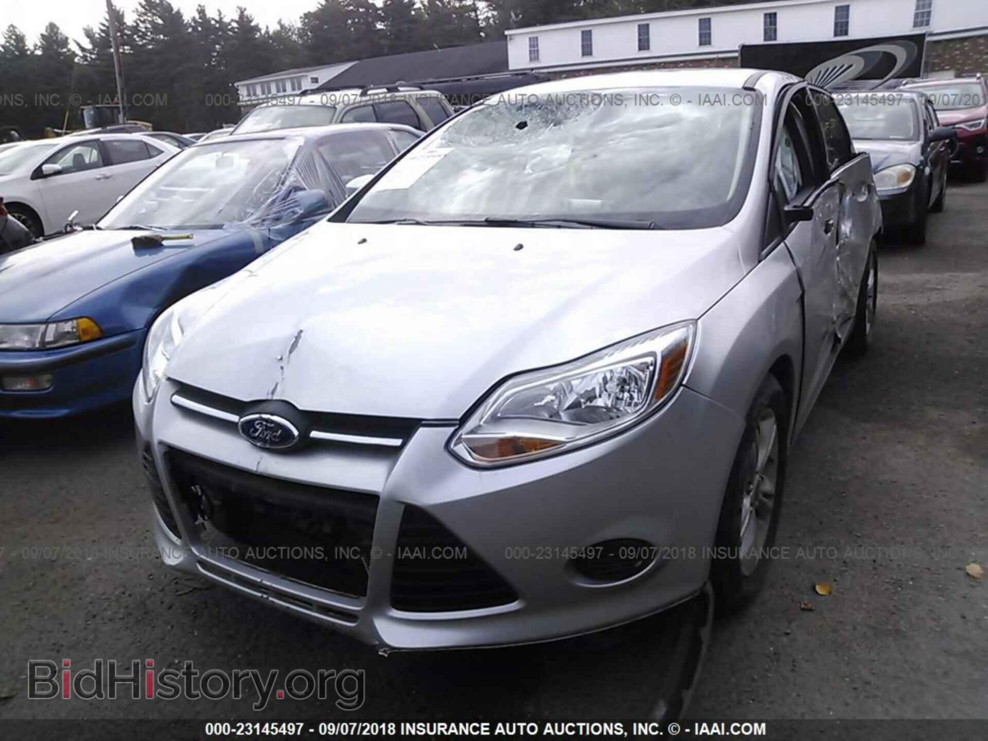 2014 Ford Focus - VIN: 1FADP3F21EL424368 - Photo 2