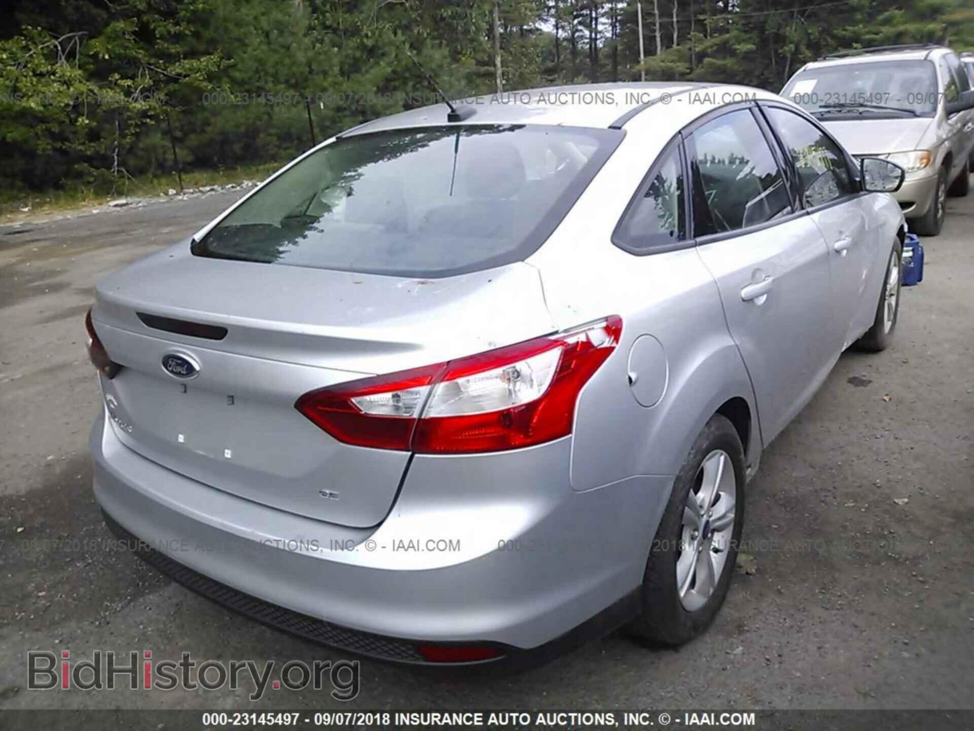 2014 Ford Focus - VIN: 1FADP3F21EL424368 - Photo 4