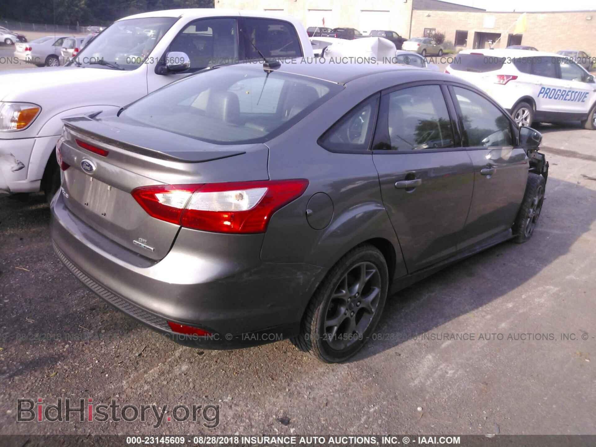 2013 Ford Focus - VIN: 1FADP3F27DL205154 - Фото 4