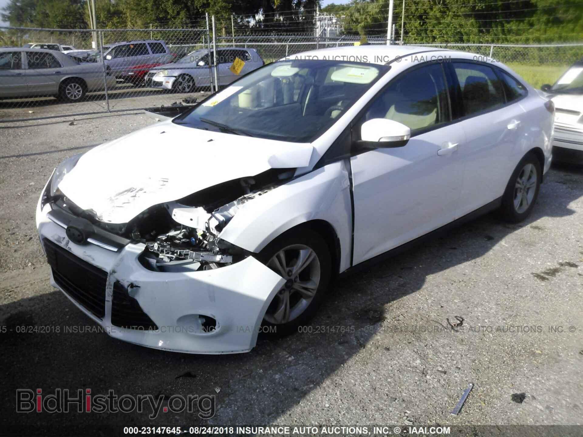 2014 Ford Focus - VIN: 1FADP3F25EL387552 - Фото 2