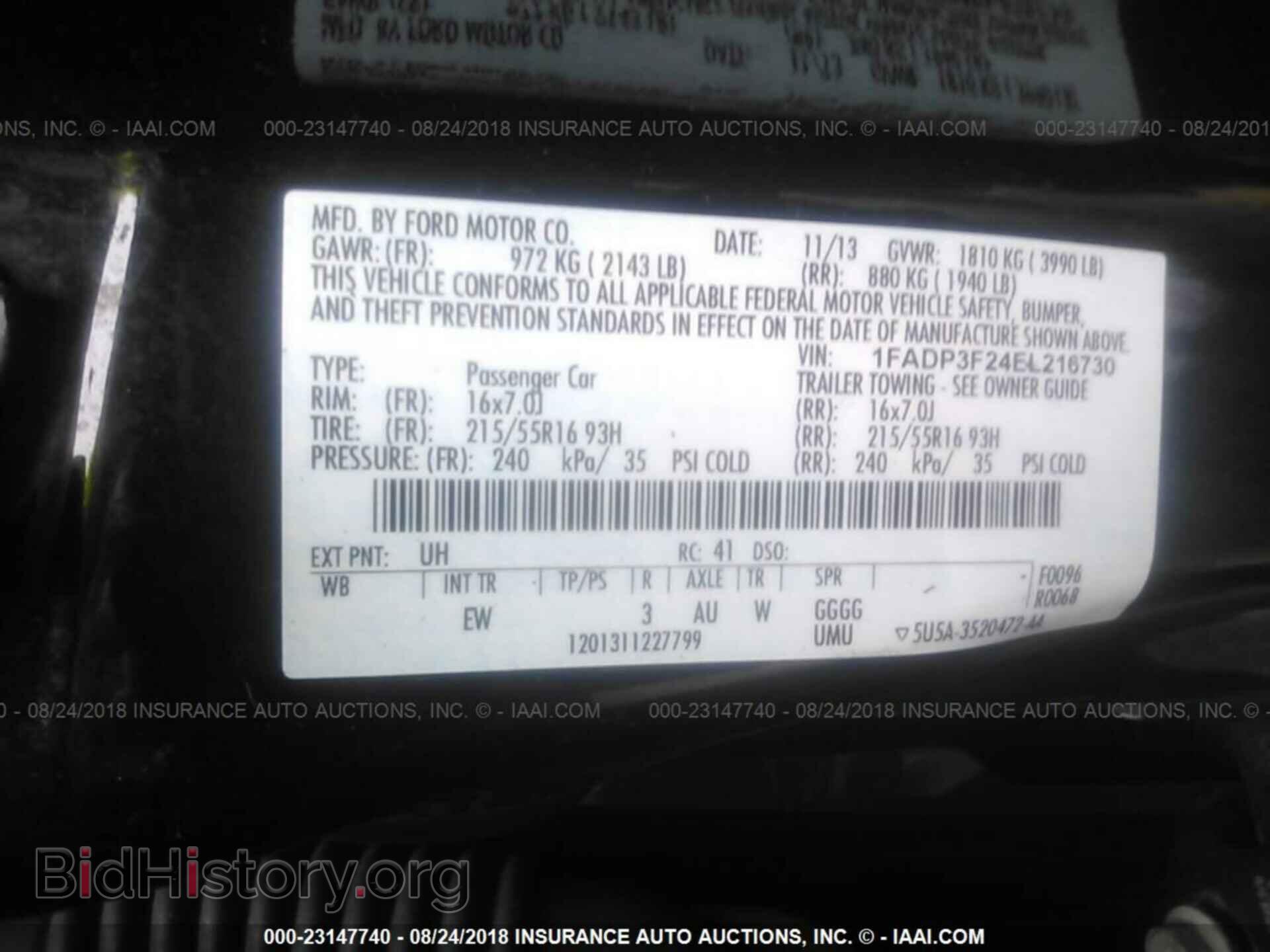 2014 Ford Focus - VIN: 1FADP3F24EL216730 - Фото 9